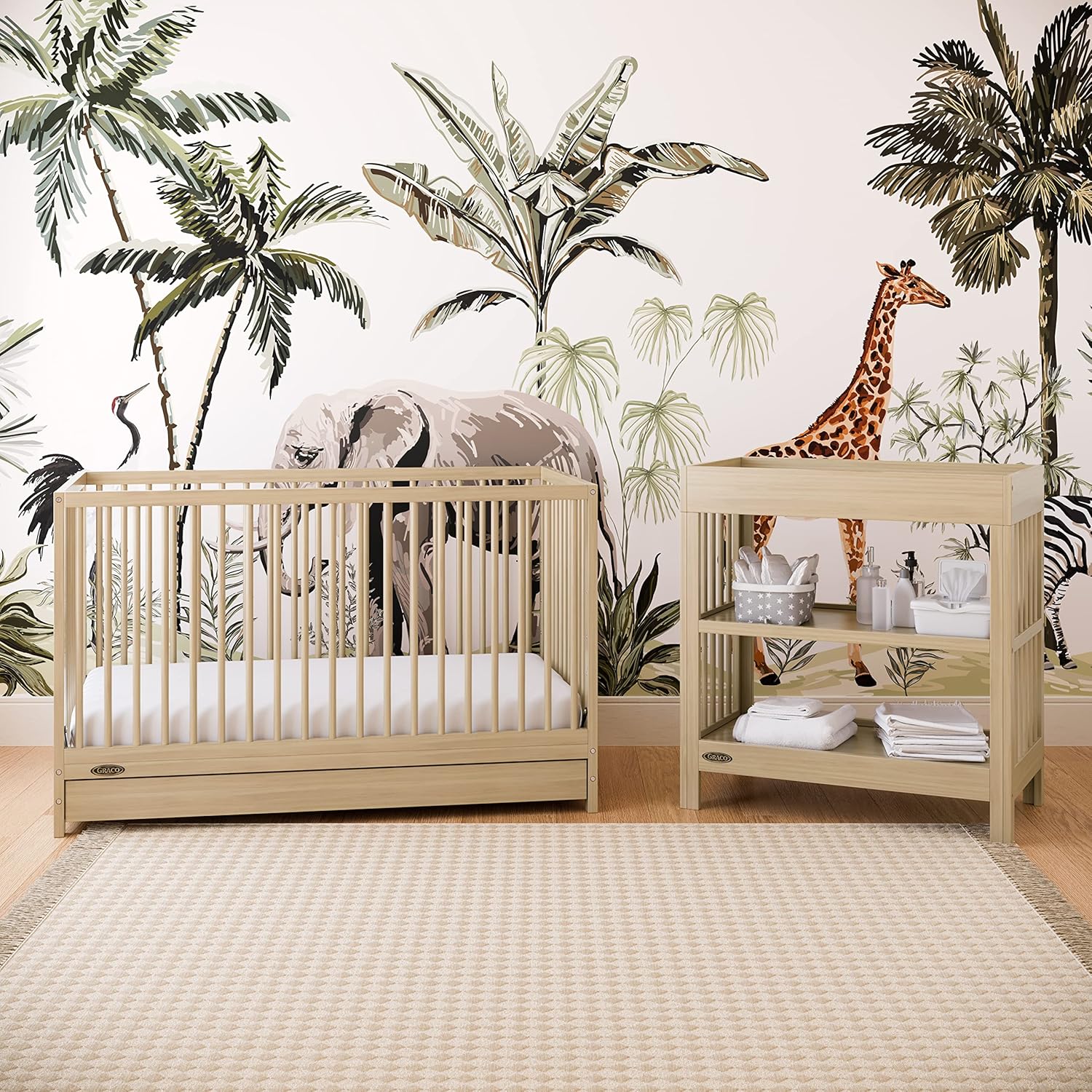 Graco Teddi Changing Table with Water-Resistant Changing Pad (Driftwood) - GREENGUARD Gold Certified, Includes Bonus Water-Resistant Changing Pad with Safety Strap, 2 Shelves, Easy-to-Match