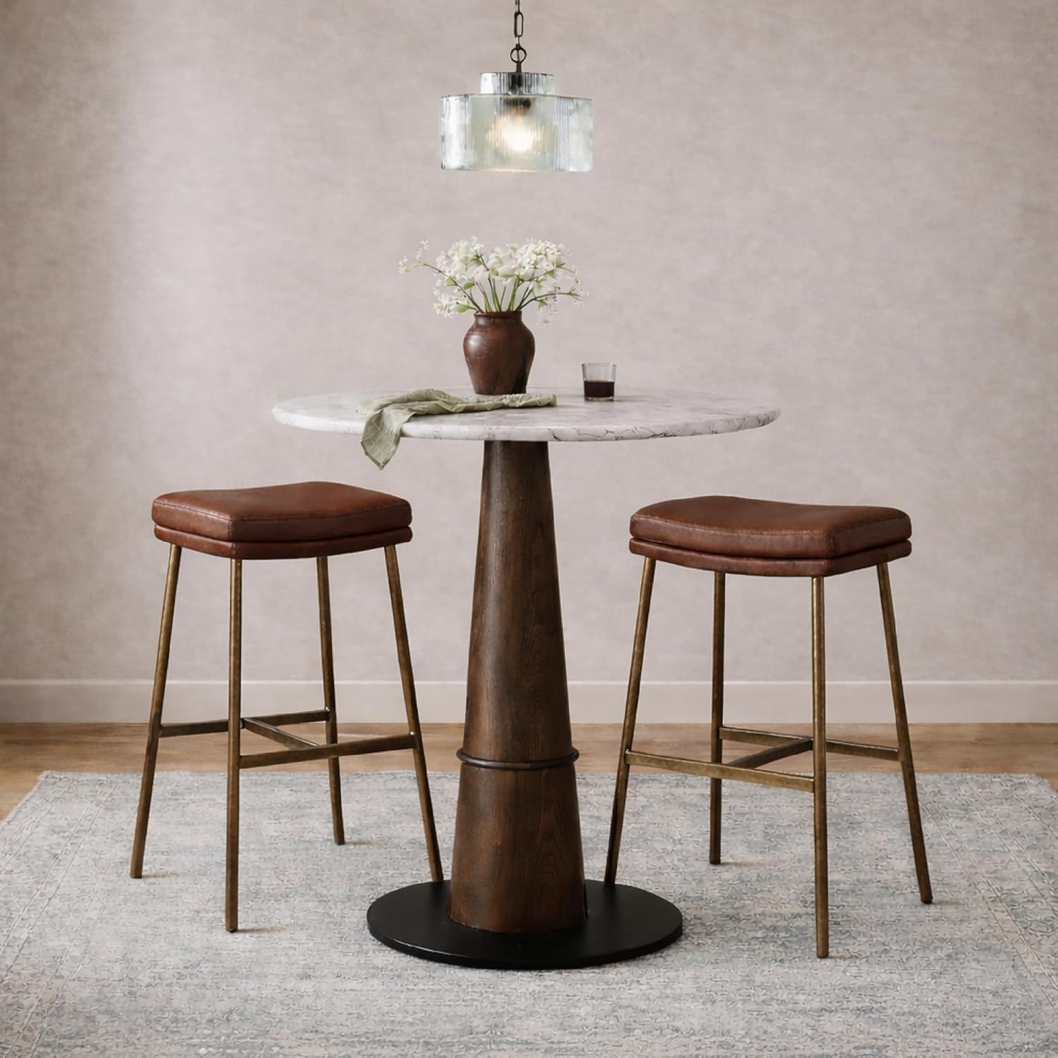 Maven Lane Berkley Backless Bar Stool 31 Inch – Saddle Stool with Footrest – Aged Gold Metal Frame & Brown Faux Leather Upholstery – Ideal for Bars, Pubs and Tall Kitchen Counters