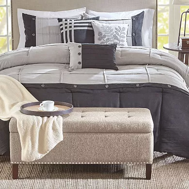 Madison Park Frances tufted storage bench in Oatmeal full view

Close-up of nailhead trim edge detail

Tufted top texture detail enhancing elegance

Hinged lid open showing spacious interior storage

Bench used as extra seating in living room

Bench styled in entryway setting