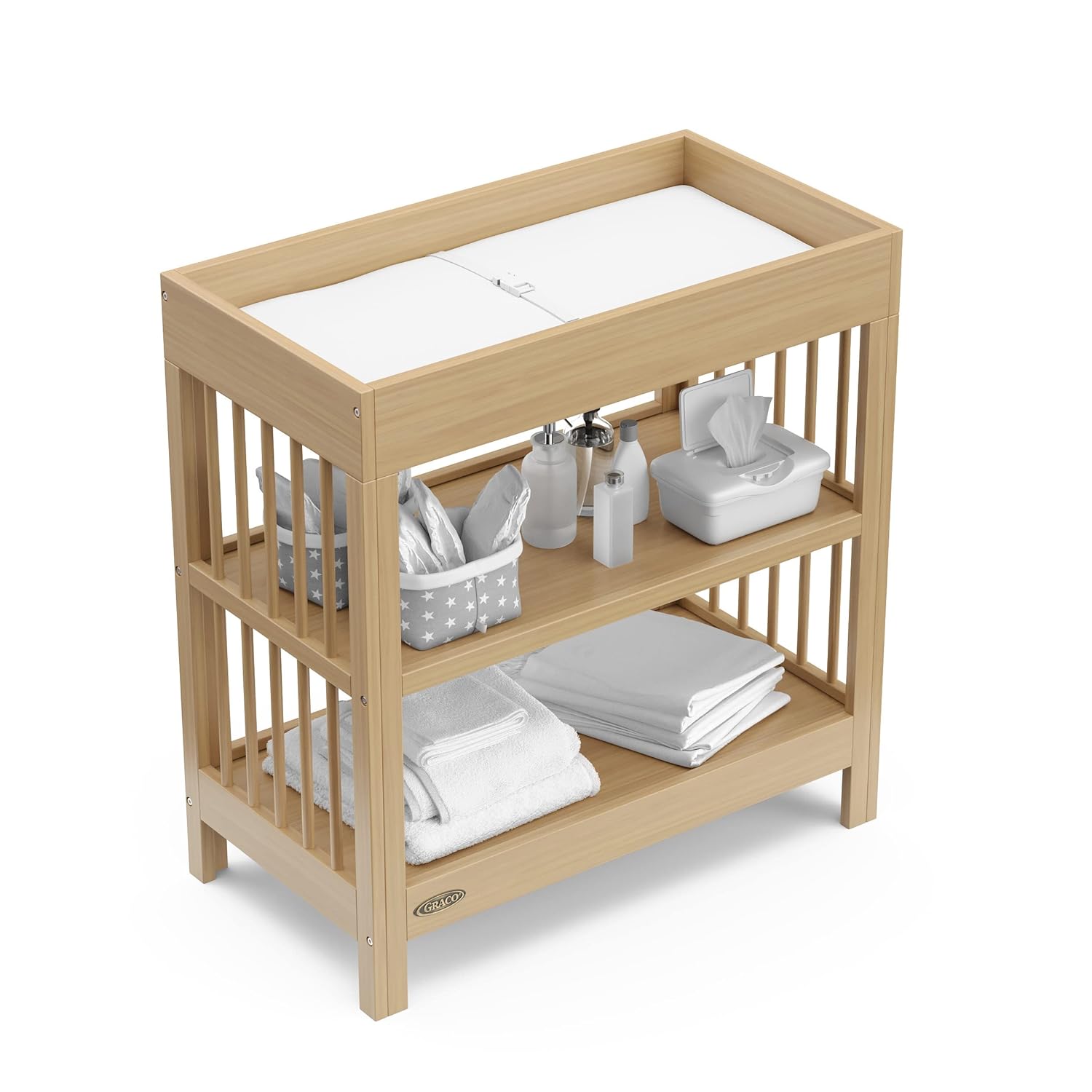 Graco Teddi Changing Table with Water-Resistant Changing Pad (Driftwood) - GREENGUARD Gold Certified, Includes Bonus Water-Resistant Changing Pad with Safety Strap, 2 Shelves, Easy-to-Match