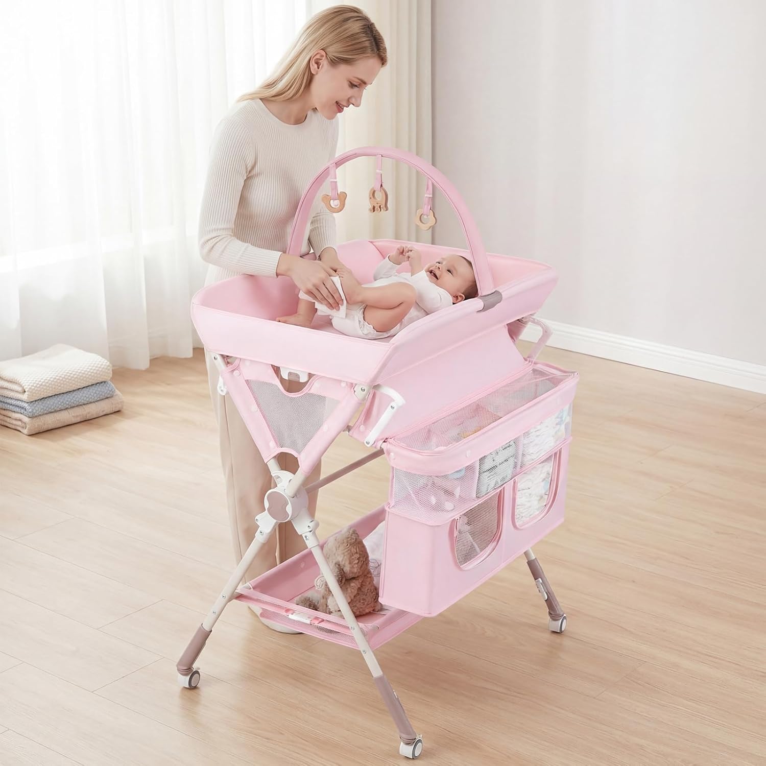 INFANS Portable Baby Changing Table with Wheels, Foldable Diaper Changing Station with Adjustable Heights, Large Organizer Storage for Newborn Infant (Pink)