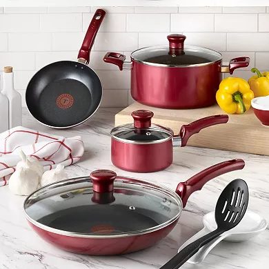 Shop the T-fal Essentials 20-Piece Cookware Set! Features Proglide nonstick interiors and Thermo-Spot heat indicator for perfect preheating. Includes frypans, saucepans, stew pot, cookie sheet, strainer & 6-piece utensil set. Dishwasher & oven safe to 350°F. Perfect for a new kitchen!