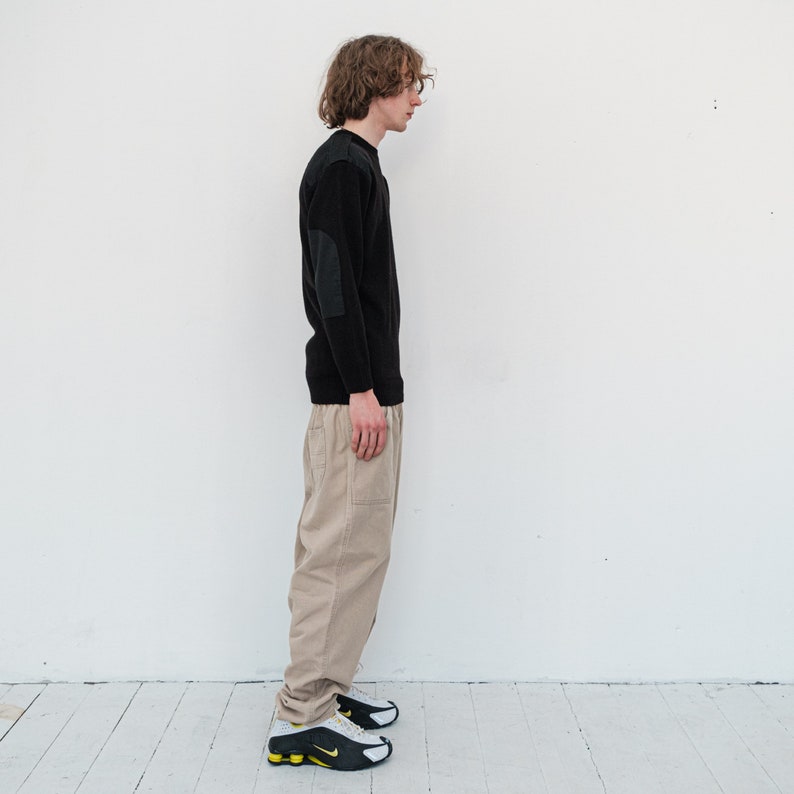 Y2K Vintage mysterious shoulder strap detail jumper in black