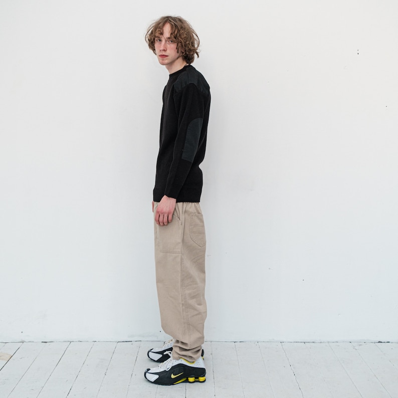 Y2K Vintage mysterious shoulder strap detail jumper in black