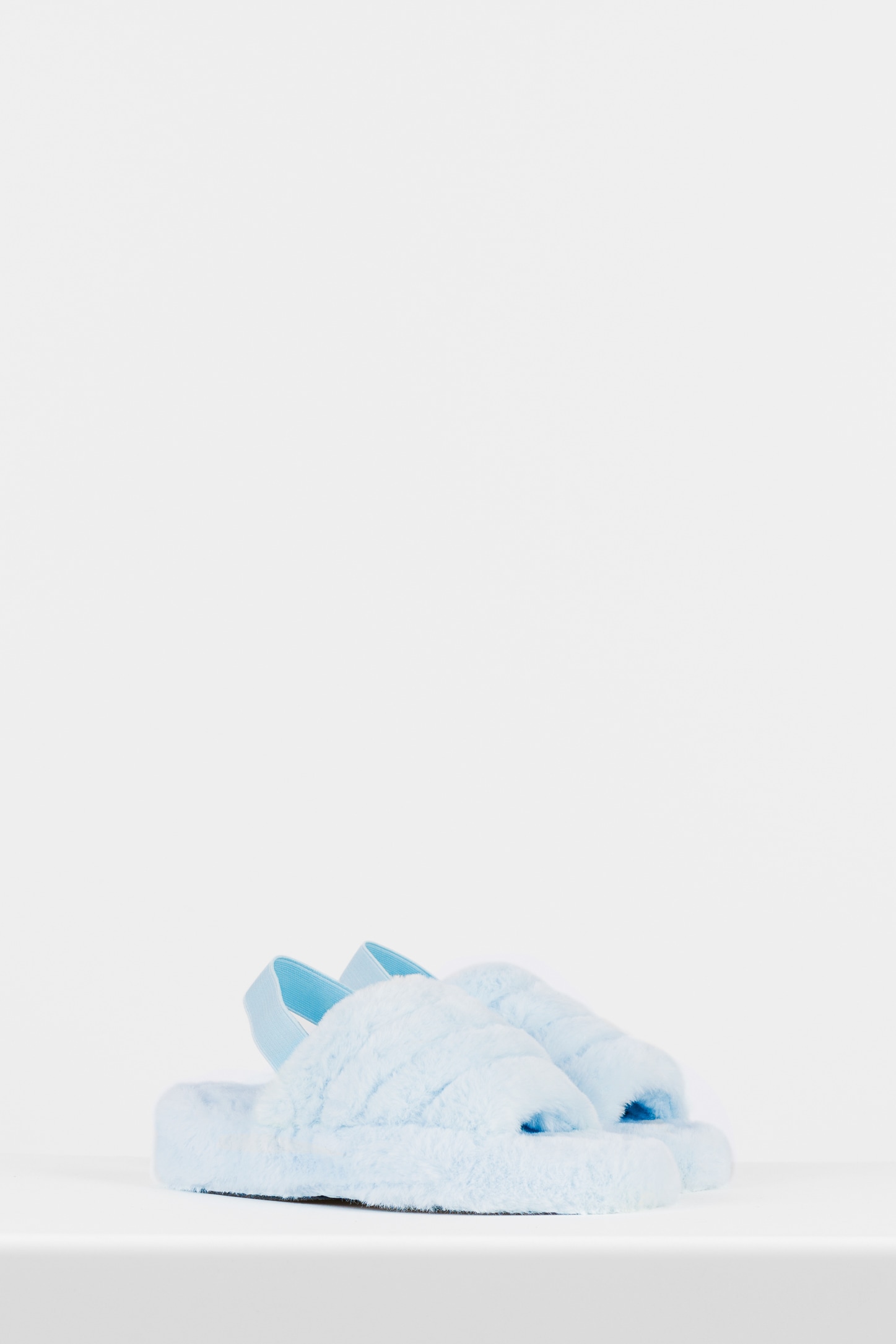 WJS niebieskie kapcie ze sztucznego futra z gumką