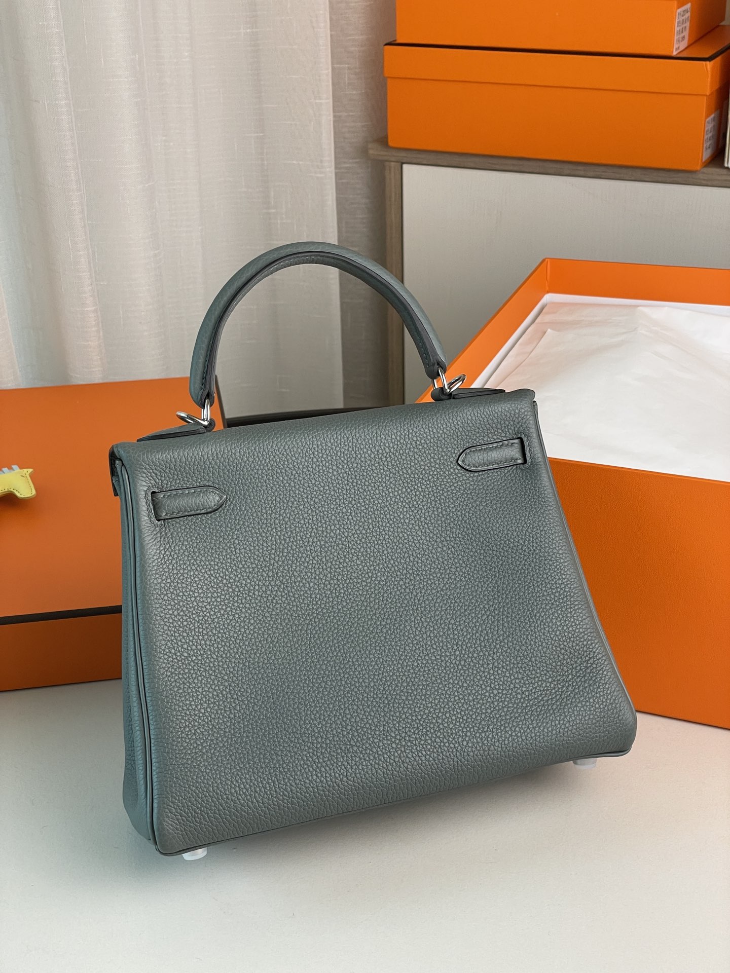 Kelly25 almond green togo leather silver buckle