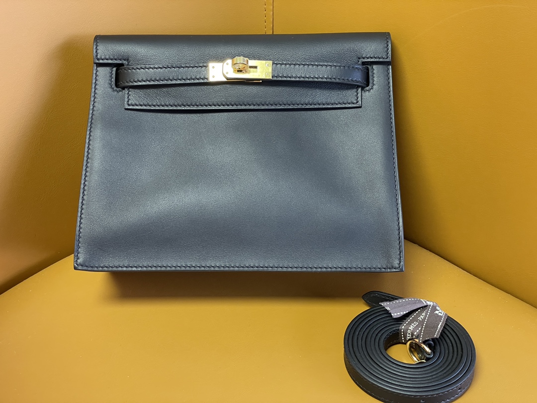 Kelly Danes black swift leather gold buckle