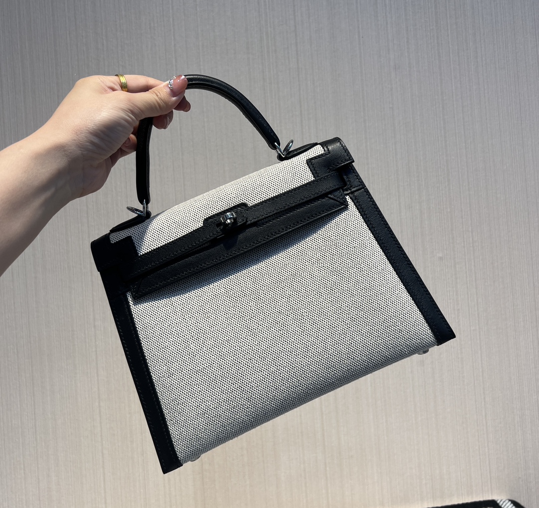 Kelly 25 canvas and swift leather second-hand bag