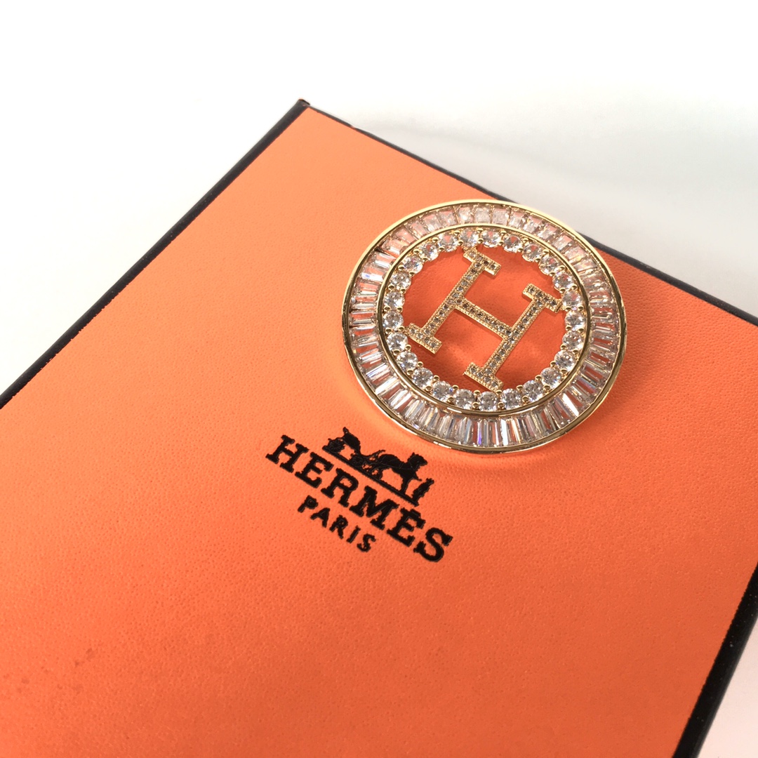 Hermes brooch