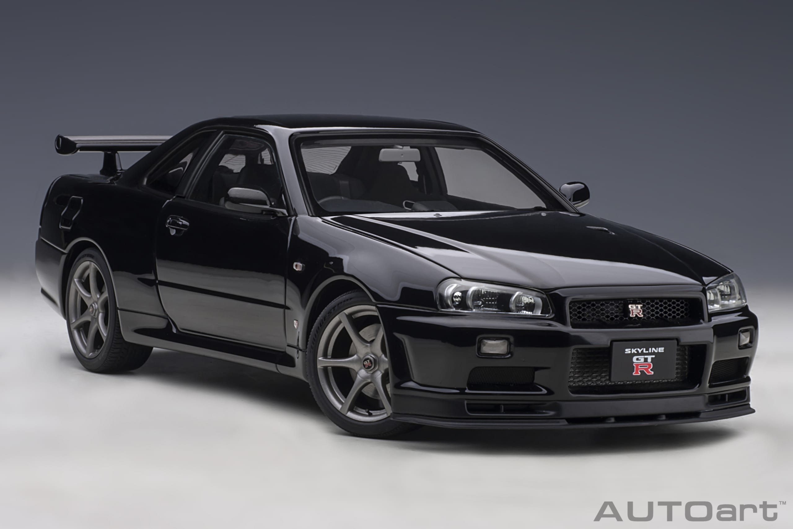 AUTOart 1:18 Nissan Skyline GT-R (R34) V-spec II (Black Pearl) 77407