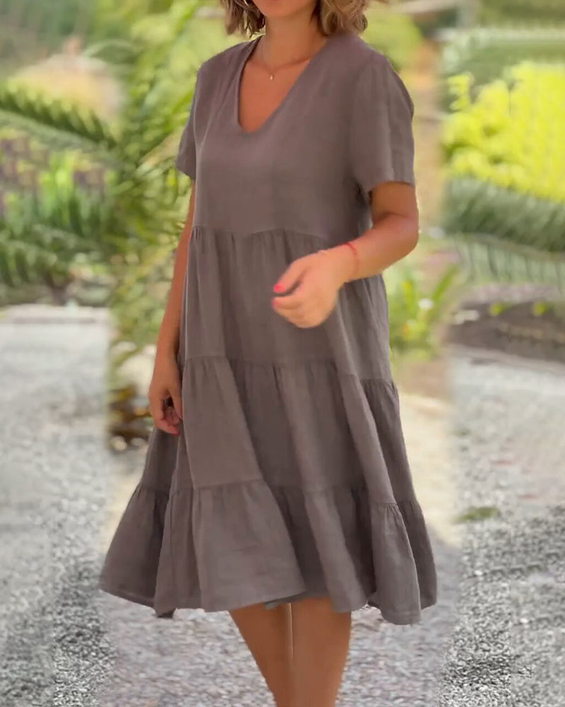 Vestido de algodón y lino con escote de pico en color liso