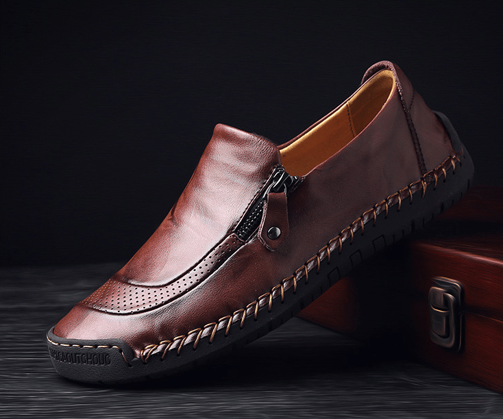 🔥Venta caliente🎁--50% DE DESCUENTO 🎉Mocasines de cuero cómodos casuales hechos a mano con cremallera lateral para hombre