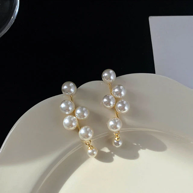 Aretes Colgantes Bohemios de Perlas en Oro