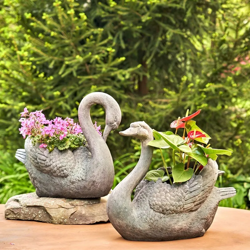 SET OF 2 MAGNESIUM SWAN PLANTERS