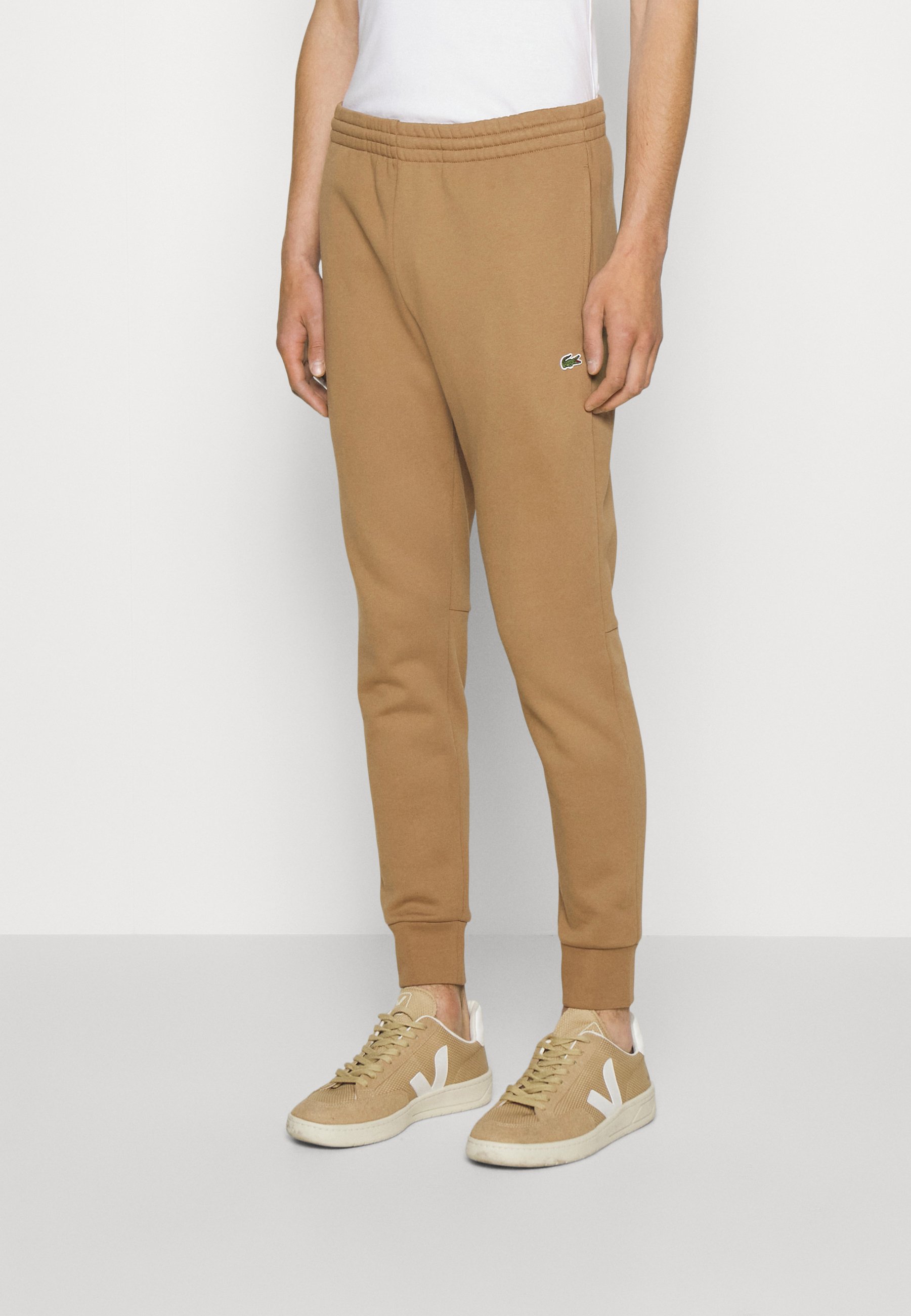 LIFESTYLETRACKPANT UNISEX - Tracksuit bottoms