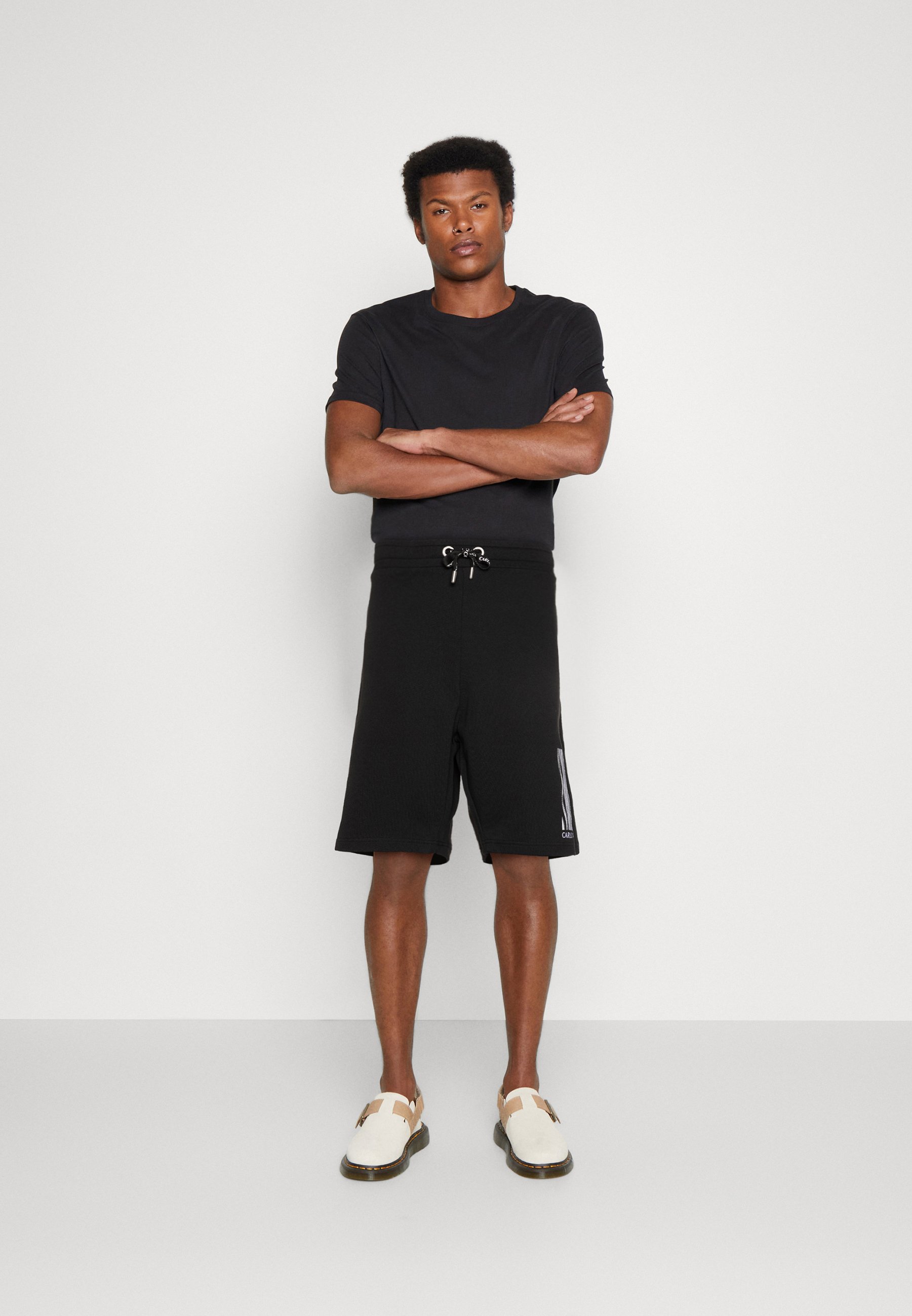 PLUS UNISEX - Shorts