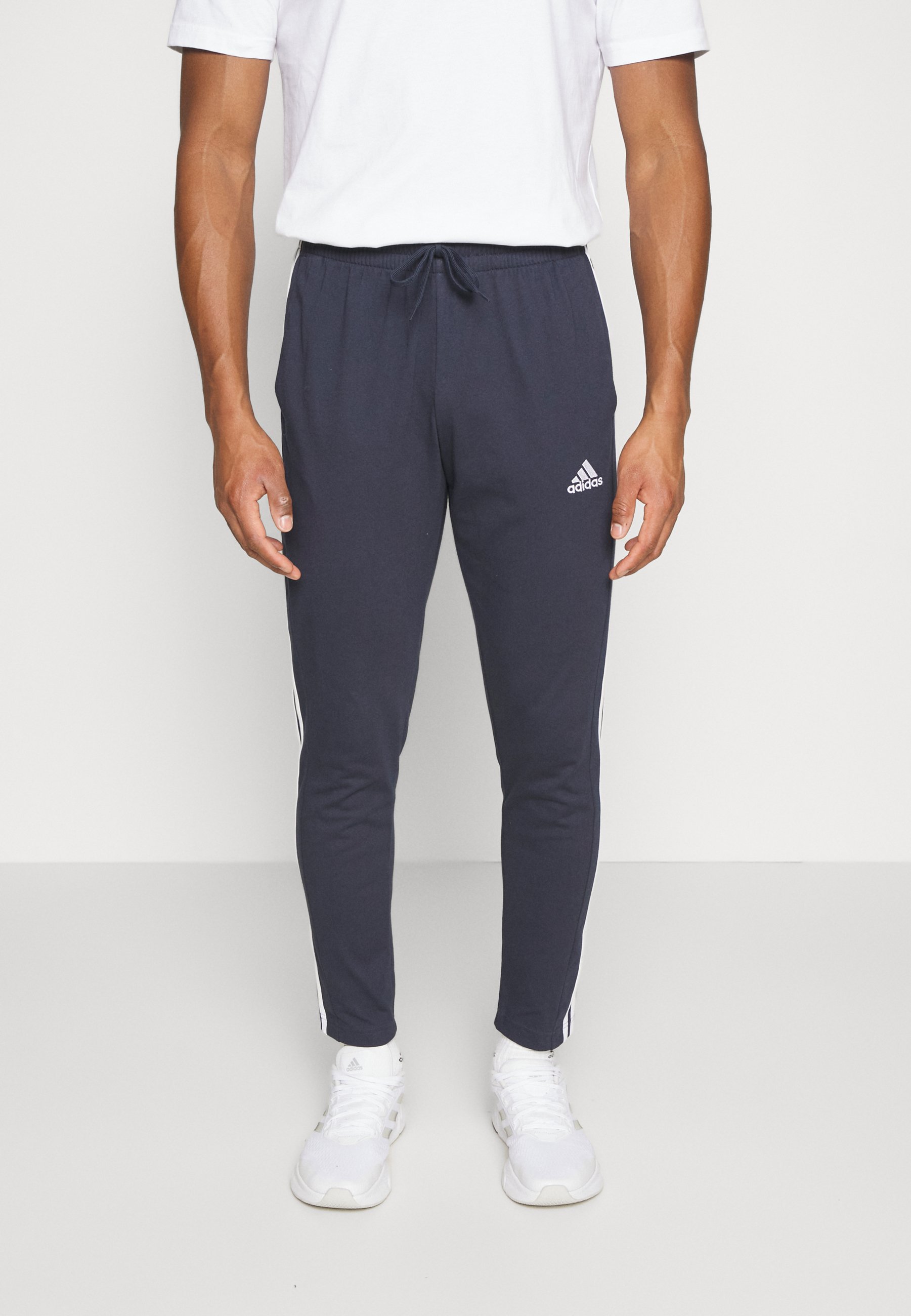 ESSENTIALS 3-STRIPES - Tracksuit bottoms