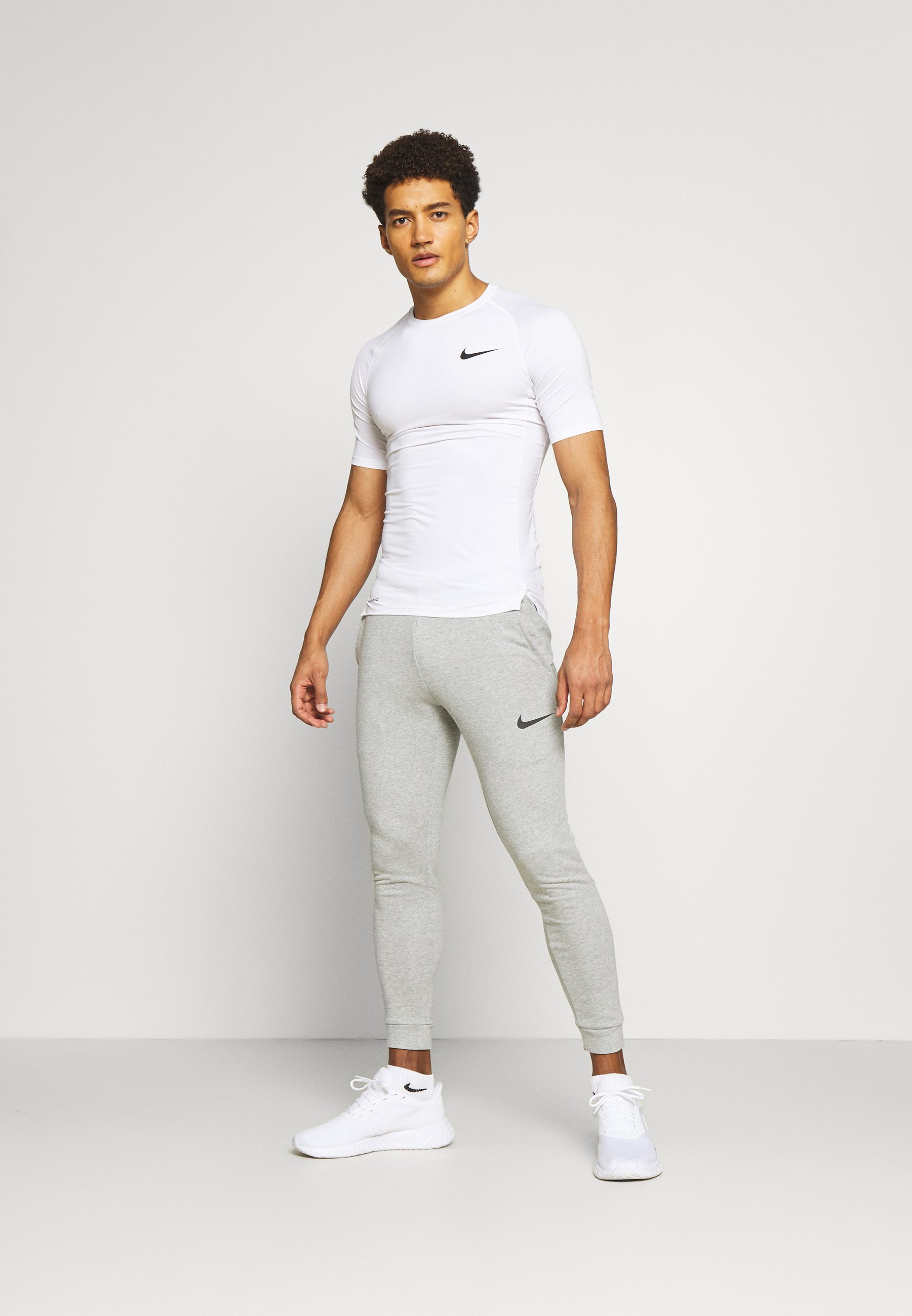 PANT TAPER - Tracksuit bottoms