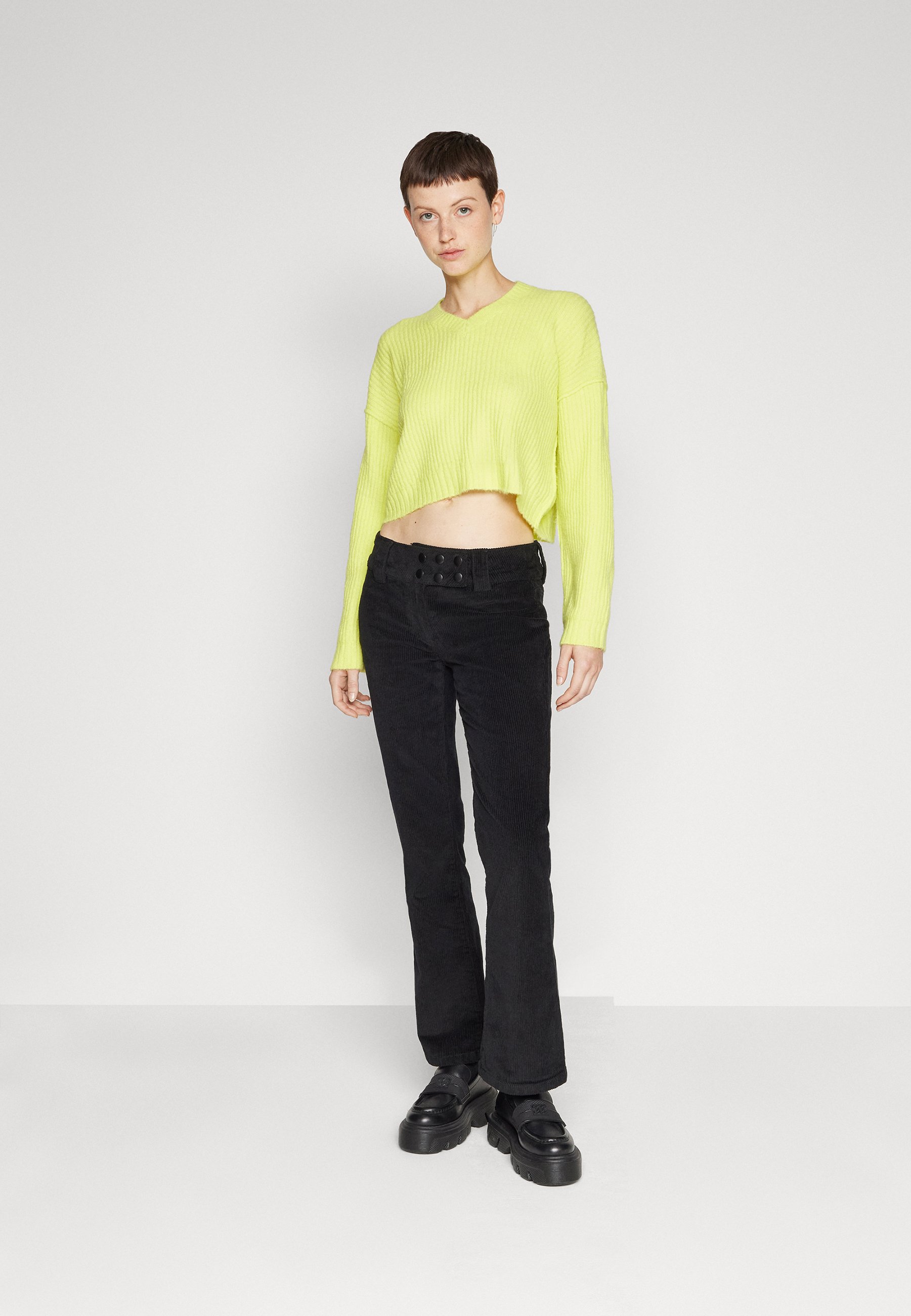 FLARE TROUSER - Trousers