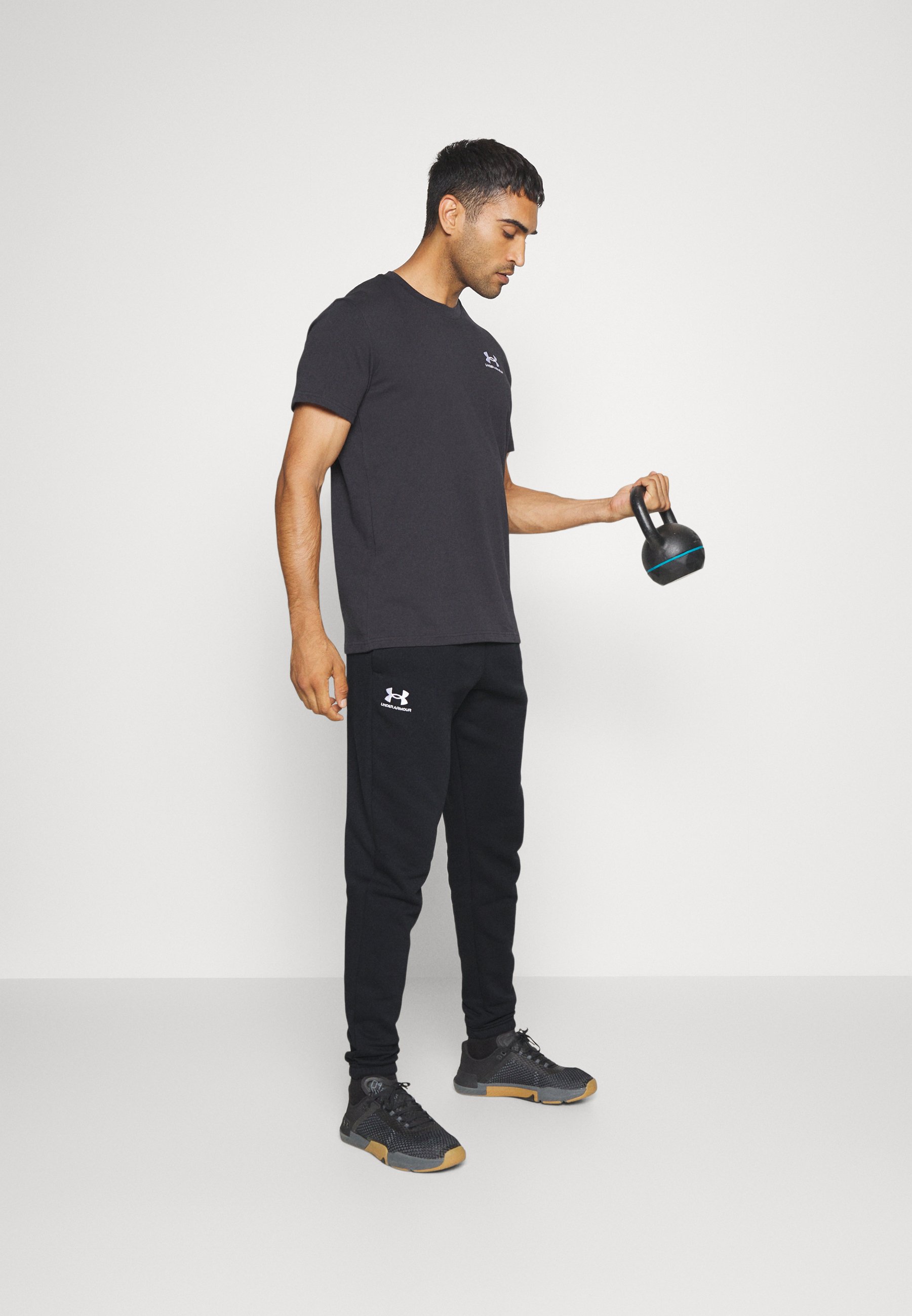 ESSENTIAL JOGGER - Tracksuit bottoms