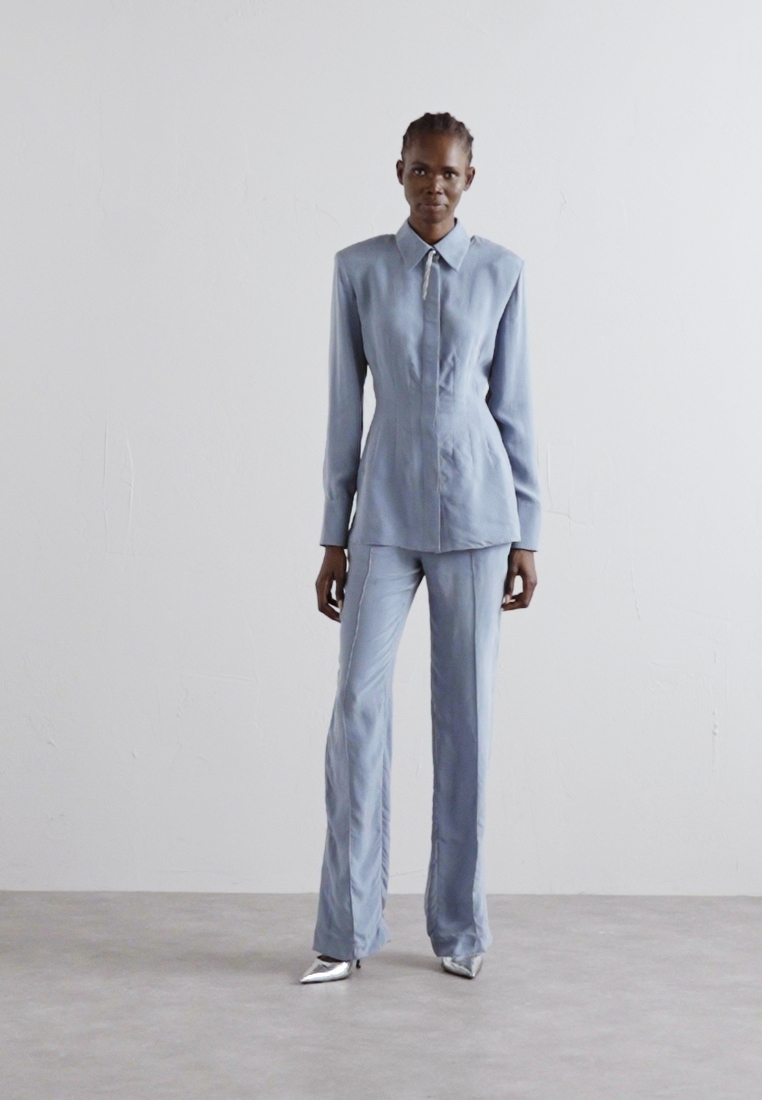 SLIT OUT PANTS - Trousers