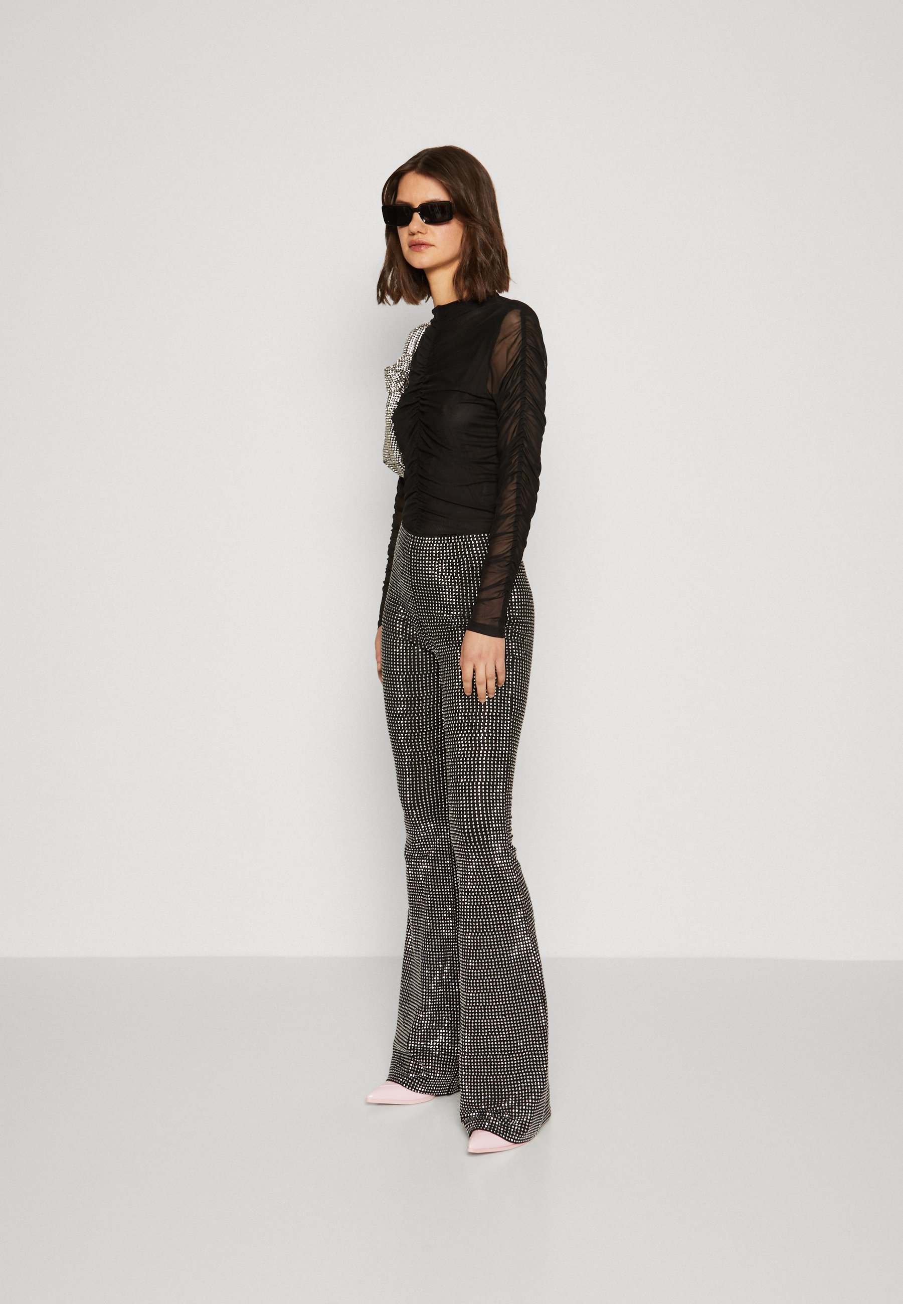 CRYSTAL PULLON FLARE - Trousers