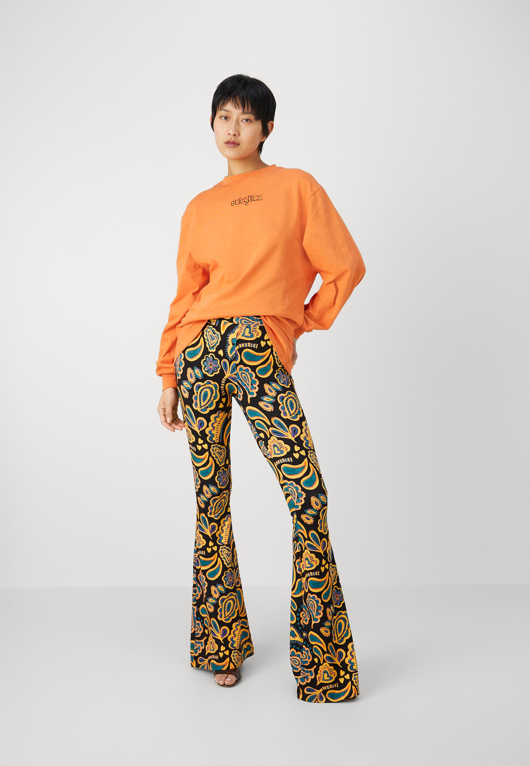PEGGY FLARED - Leggings - Trousers