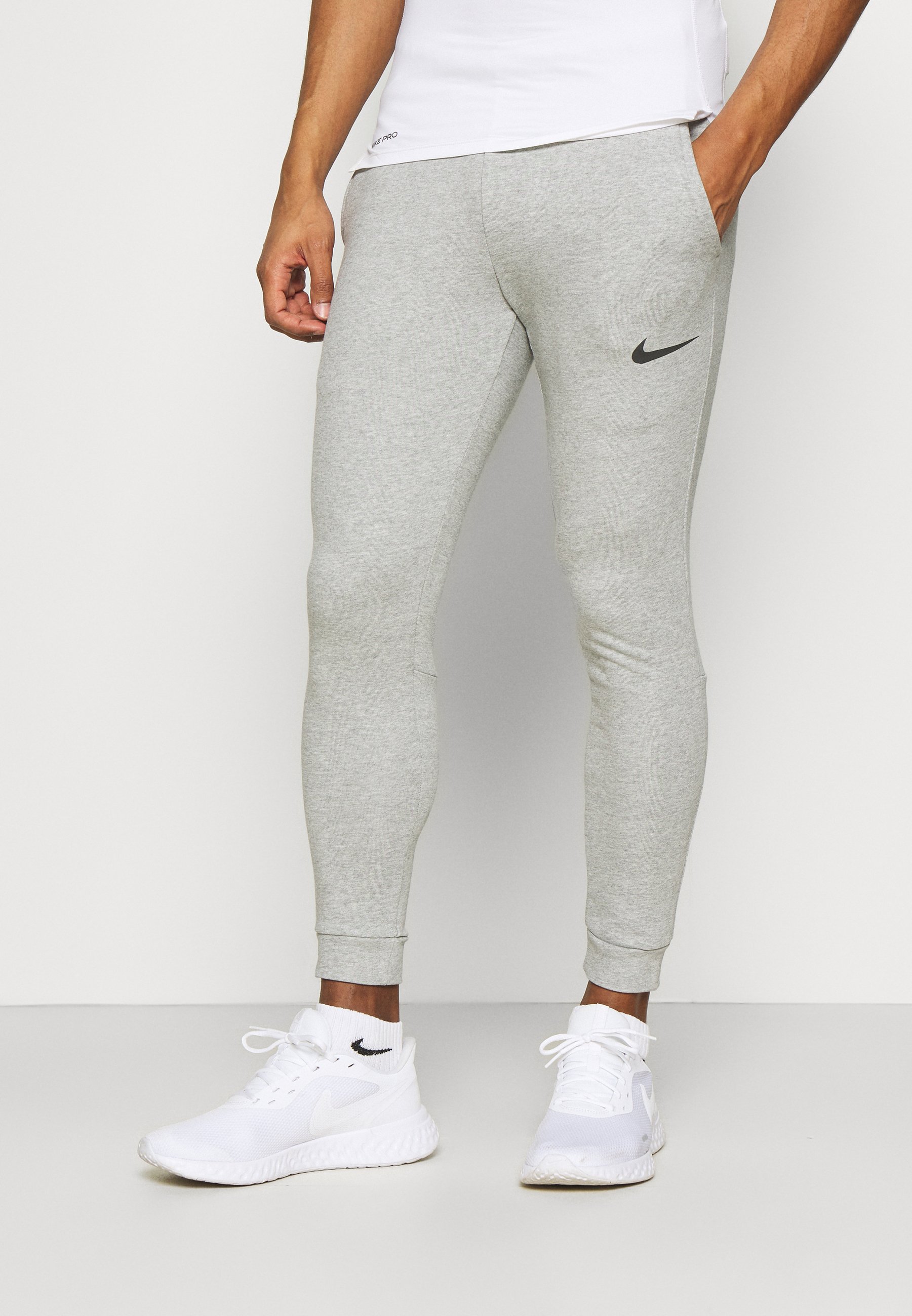 PANT TAPER - Tracksuit bottoms
