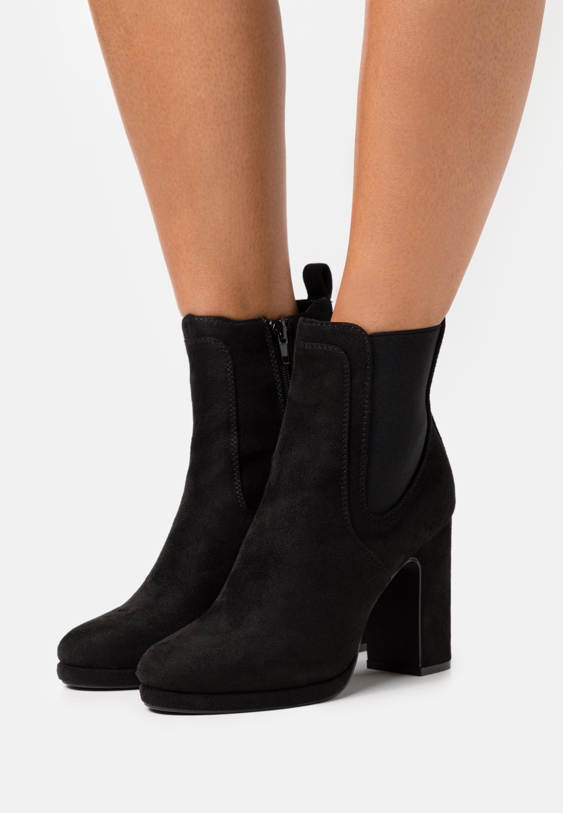High heeled ankle boots