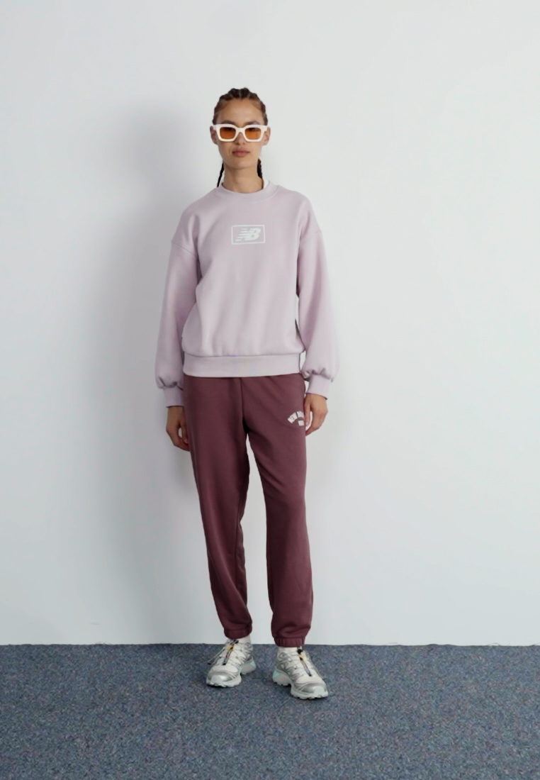 ESSENTIALS VARSITY - Tracksuit bottoms