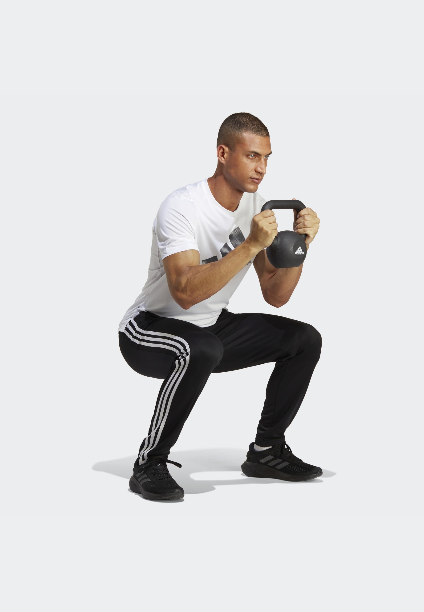 TRAIN ESSENTIALS JOGGERS - Tracksuit bottoms