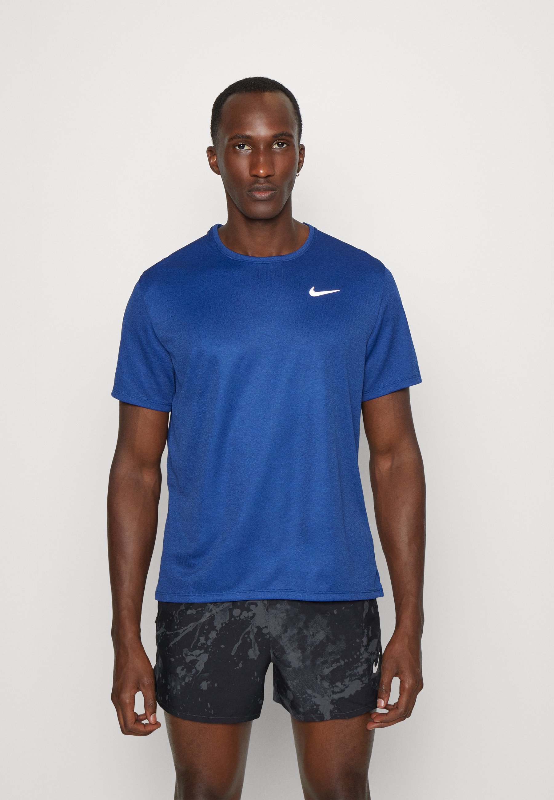 MILER - Sports T-shirt