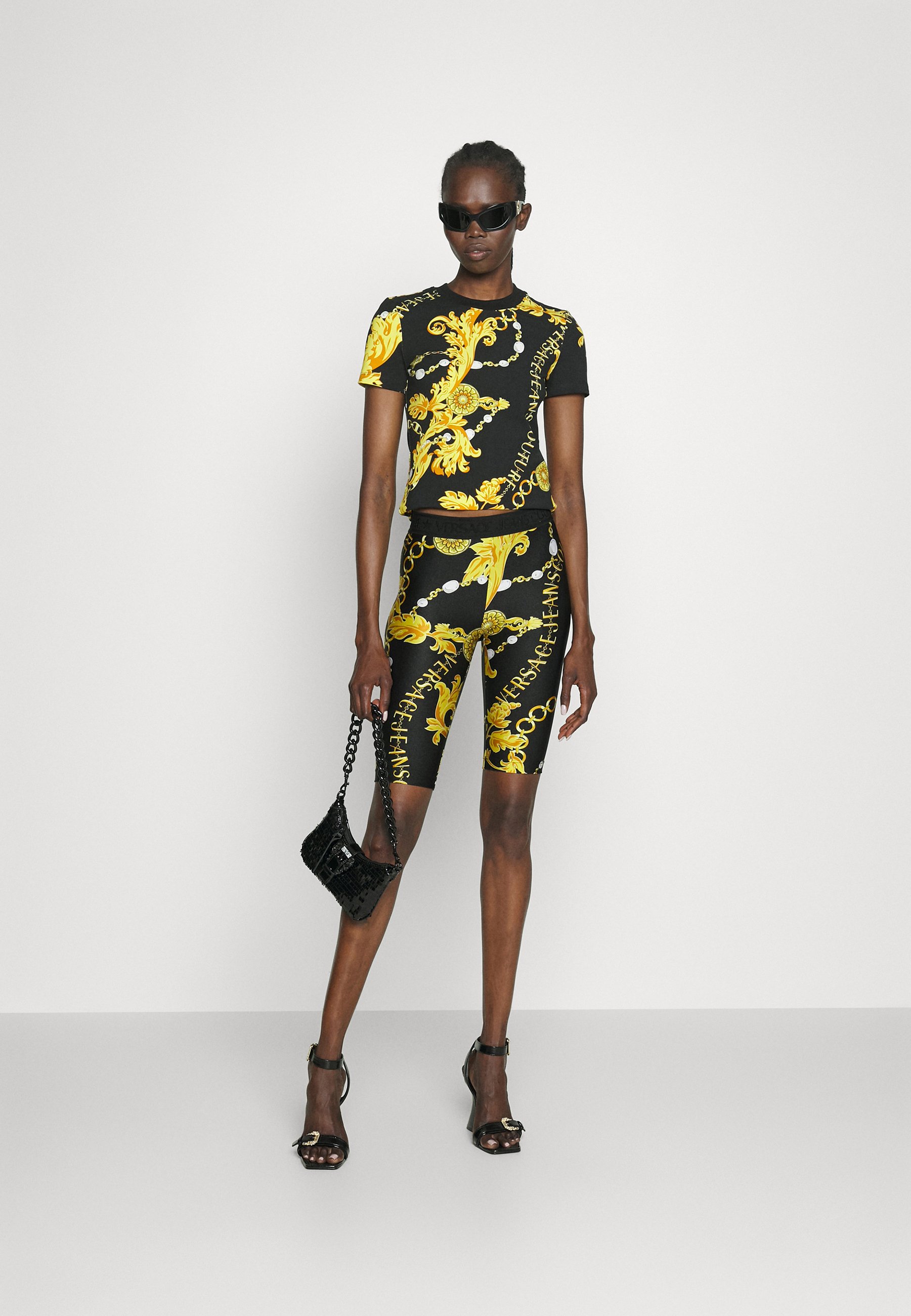 PRINT CHAIN - Leggings - Trousers
