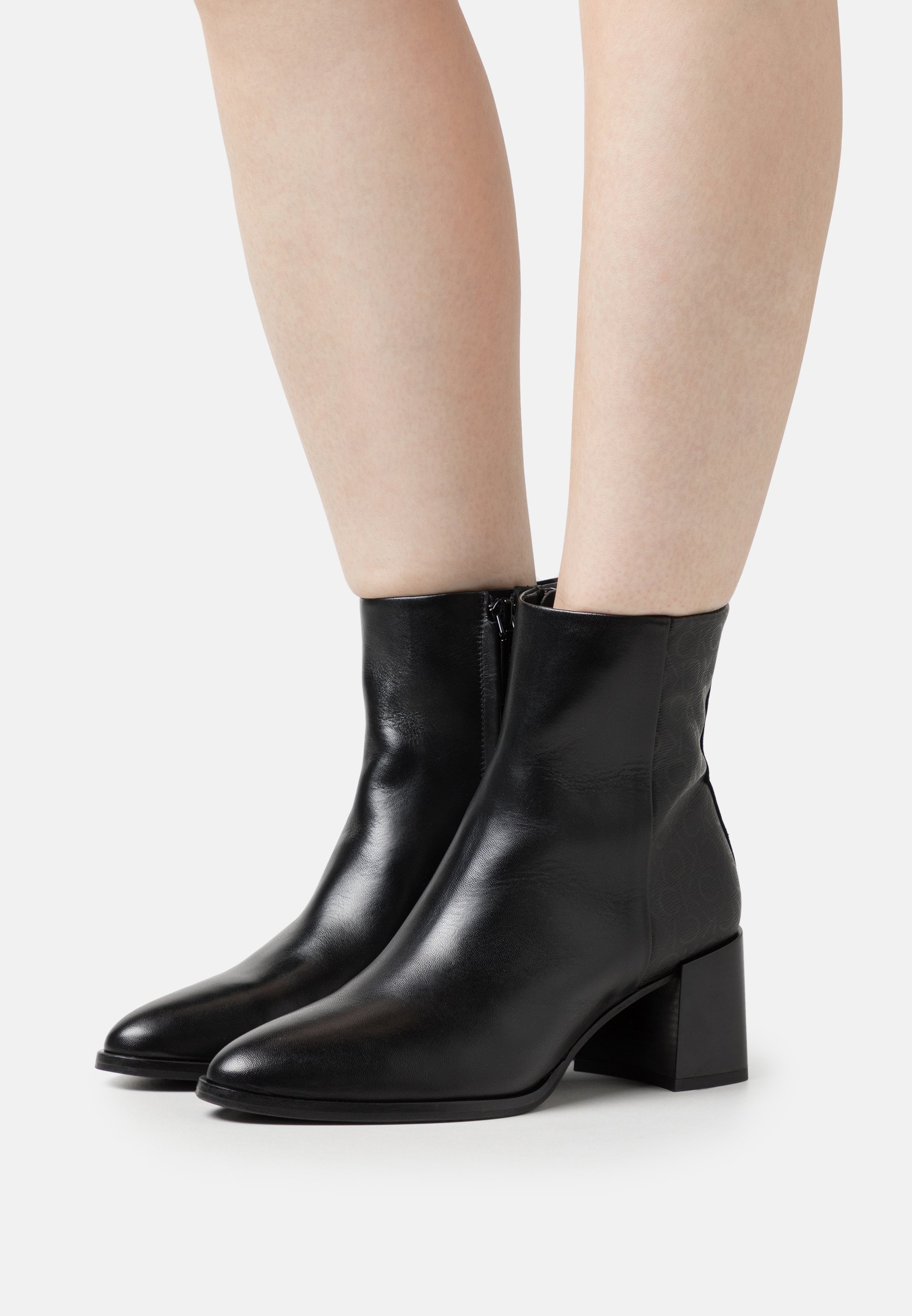 ALMOND- Classic ankle boots
