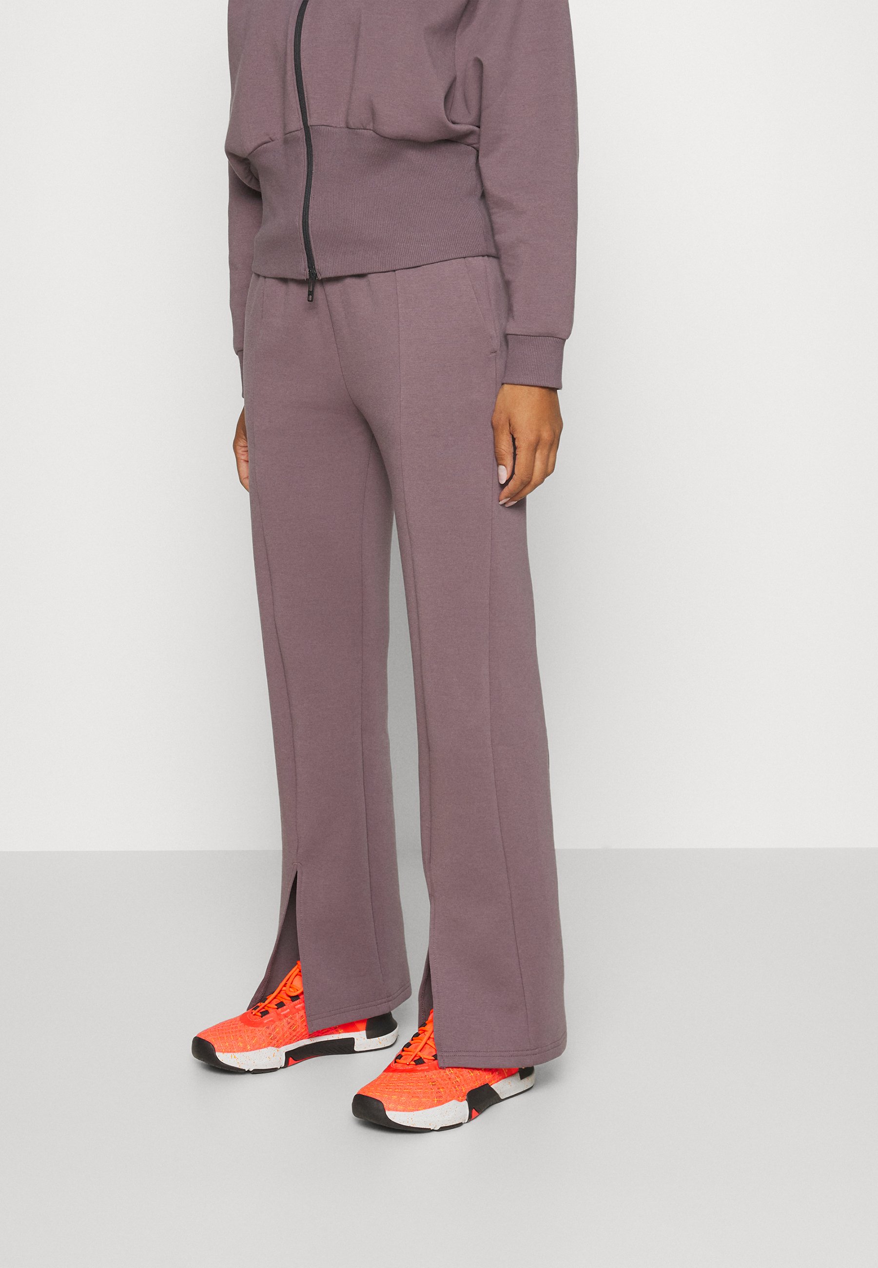 UNSTOPPABLE SPLIT PANT - Tracksuit bottoms