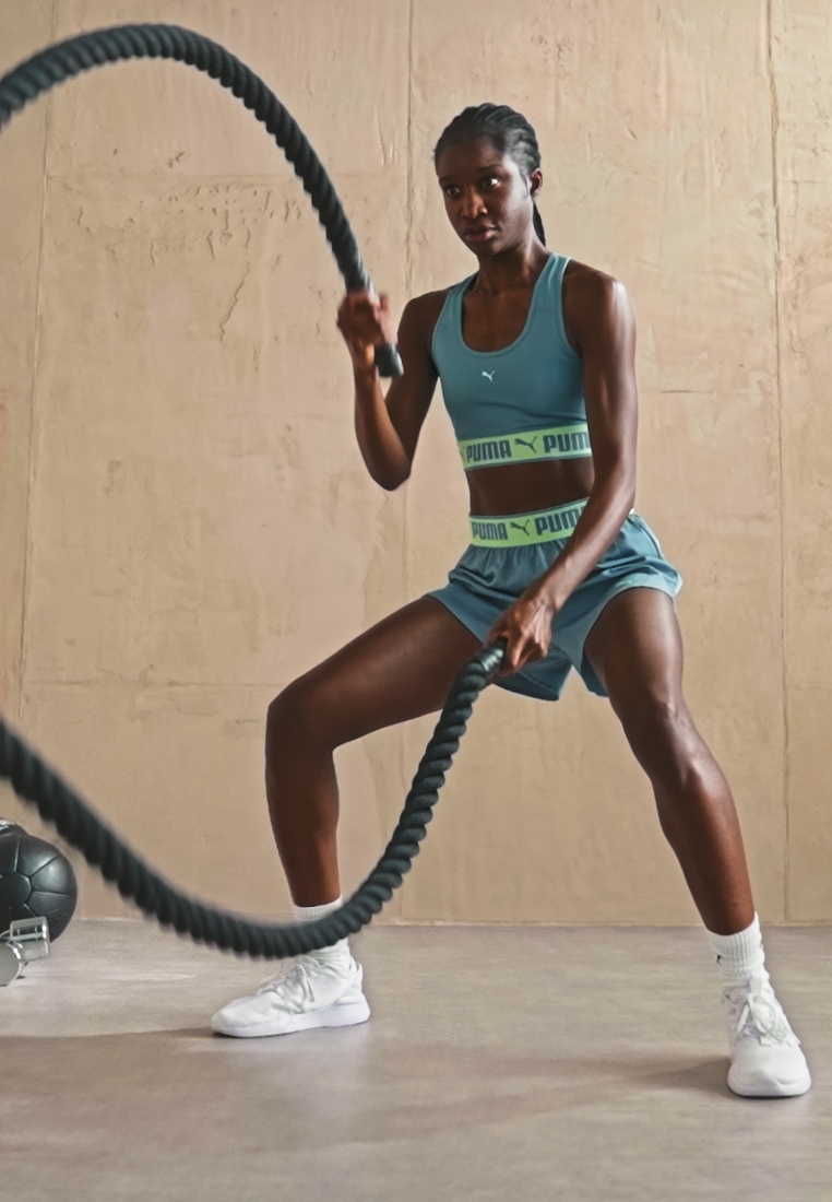 TRAIN STRONG - Sports shorts