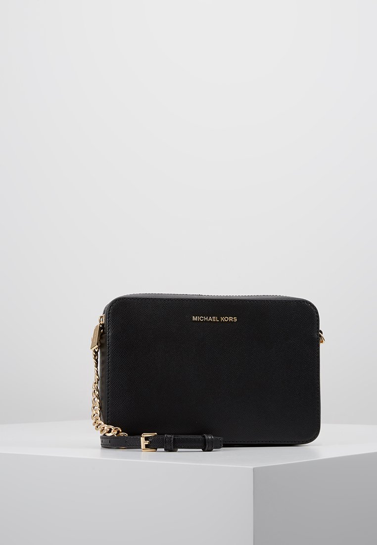 JET SET TRAVEL CROSSBODY - Across body bag