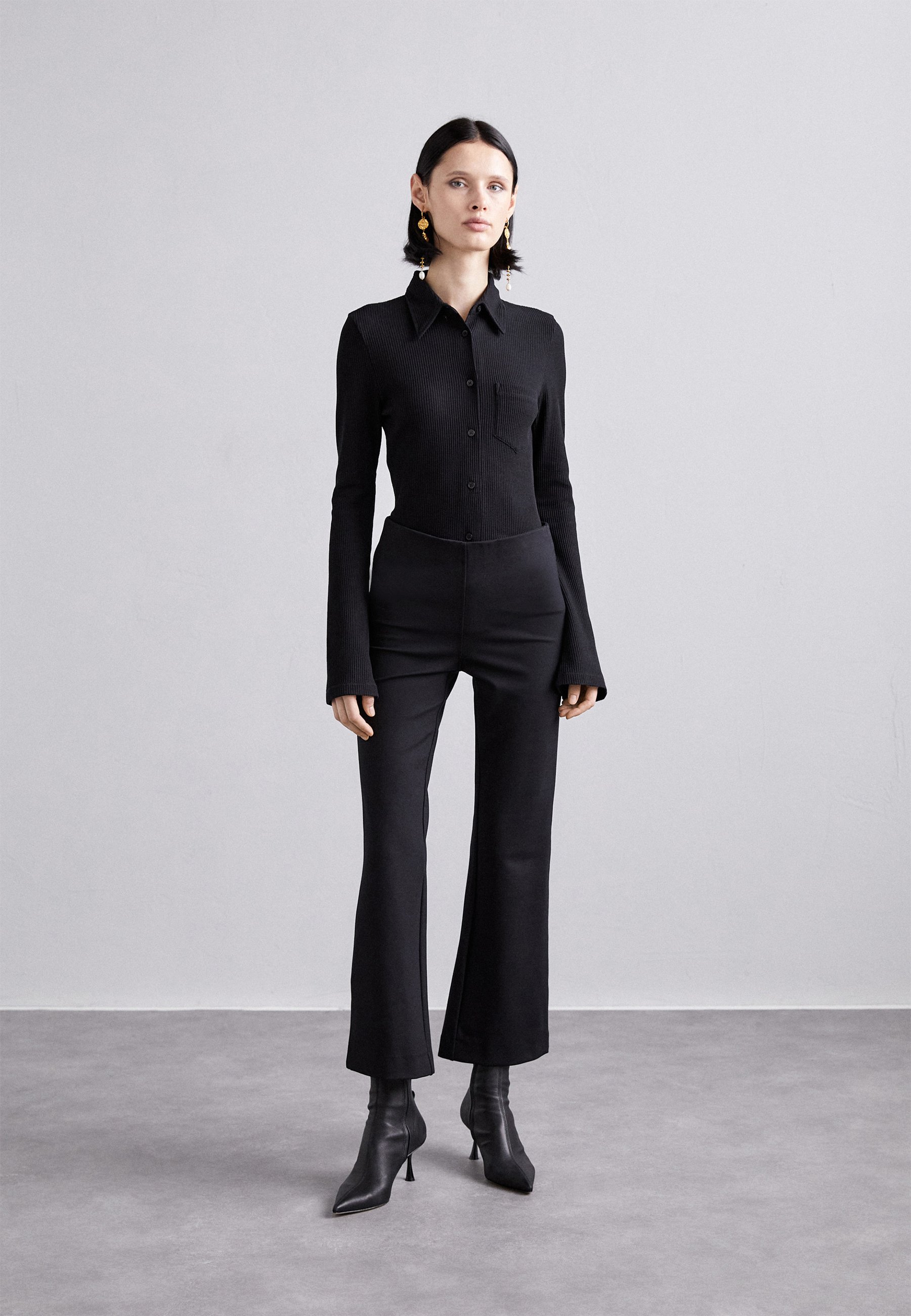 FLARED TROUSERS - Trousers