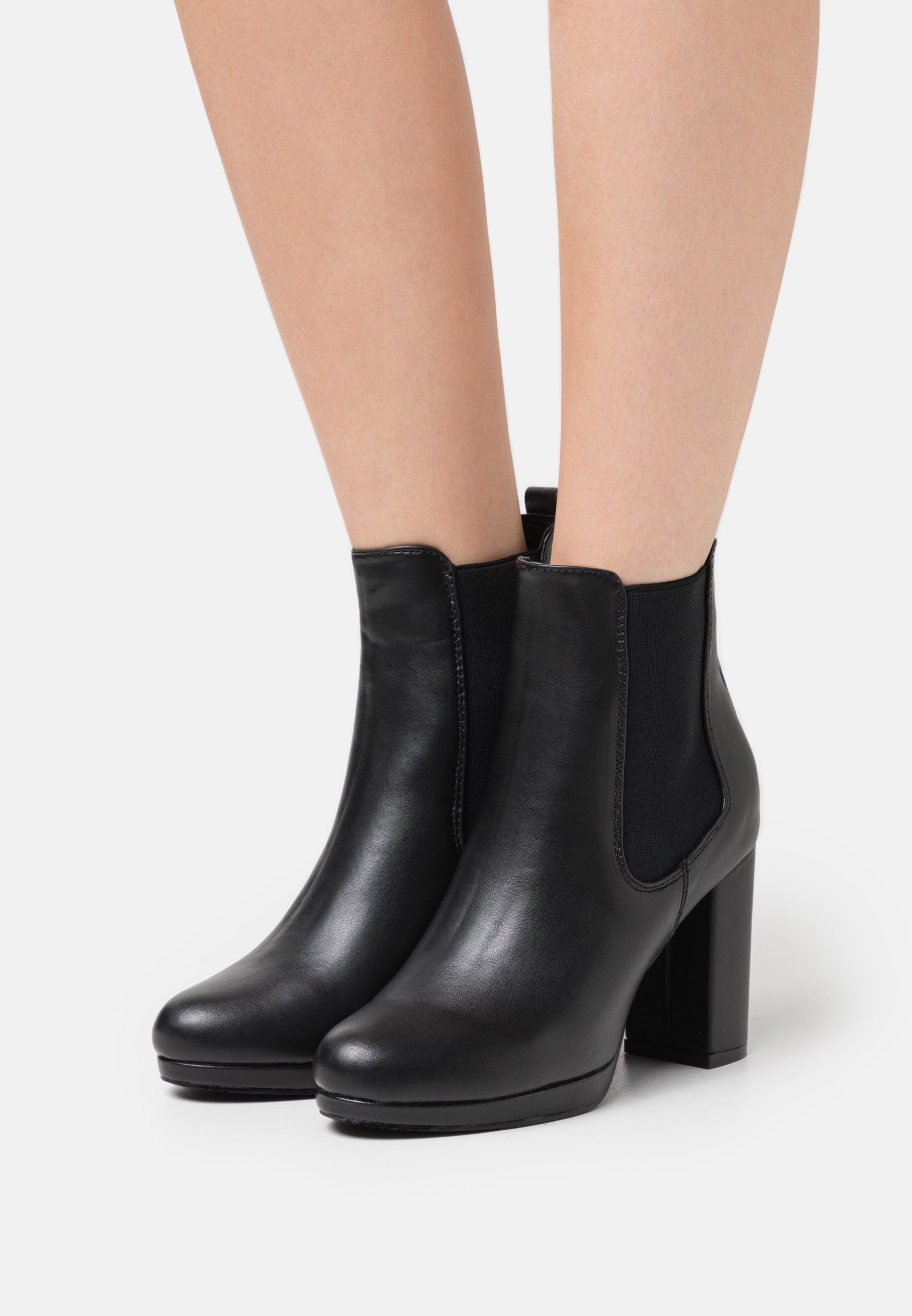 High heeled ankle boots