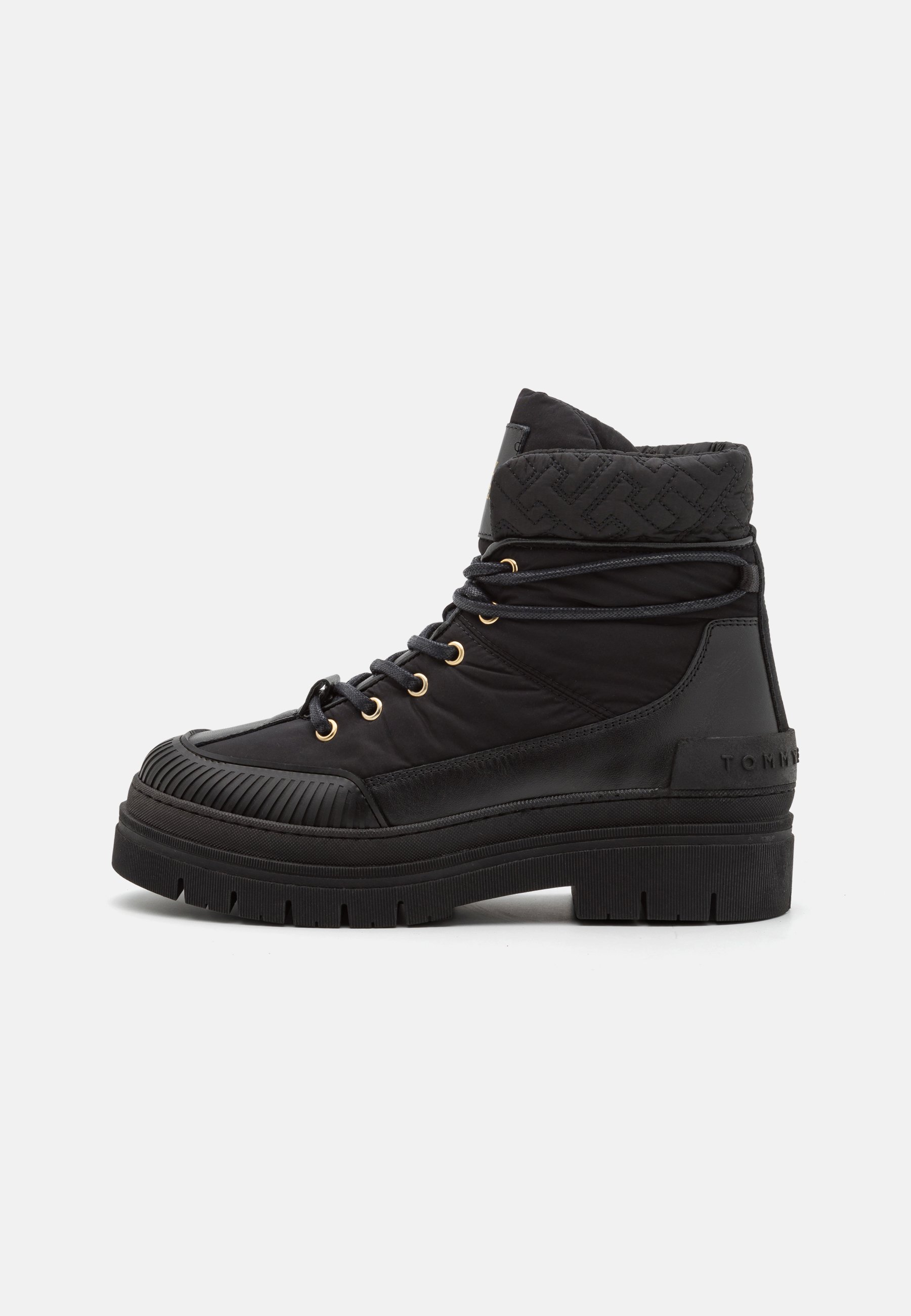 MONOGRAM OUTDOOR BOOT - Platform ankle boots