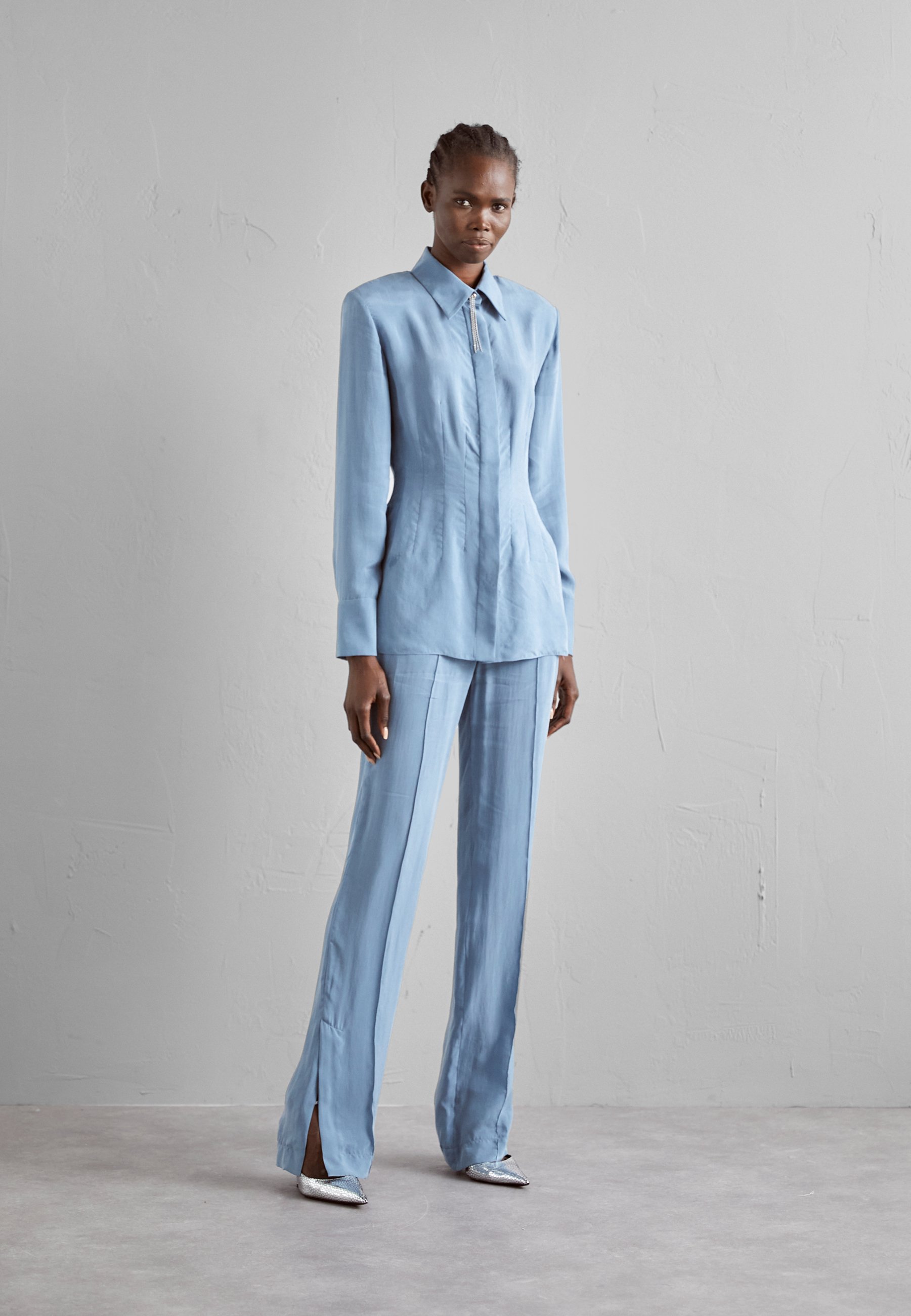 SLIT OUT PANTS - Trousers