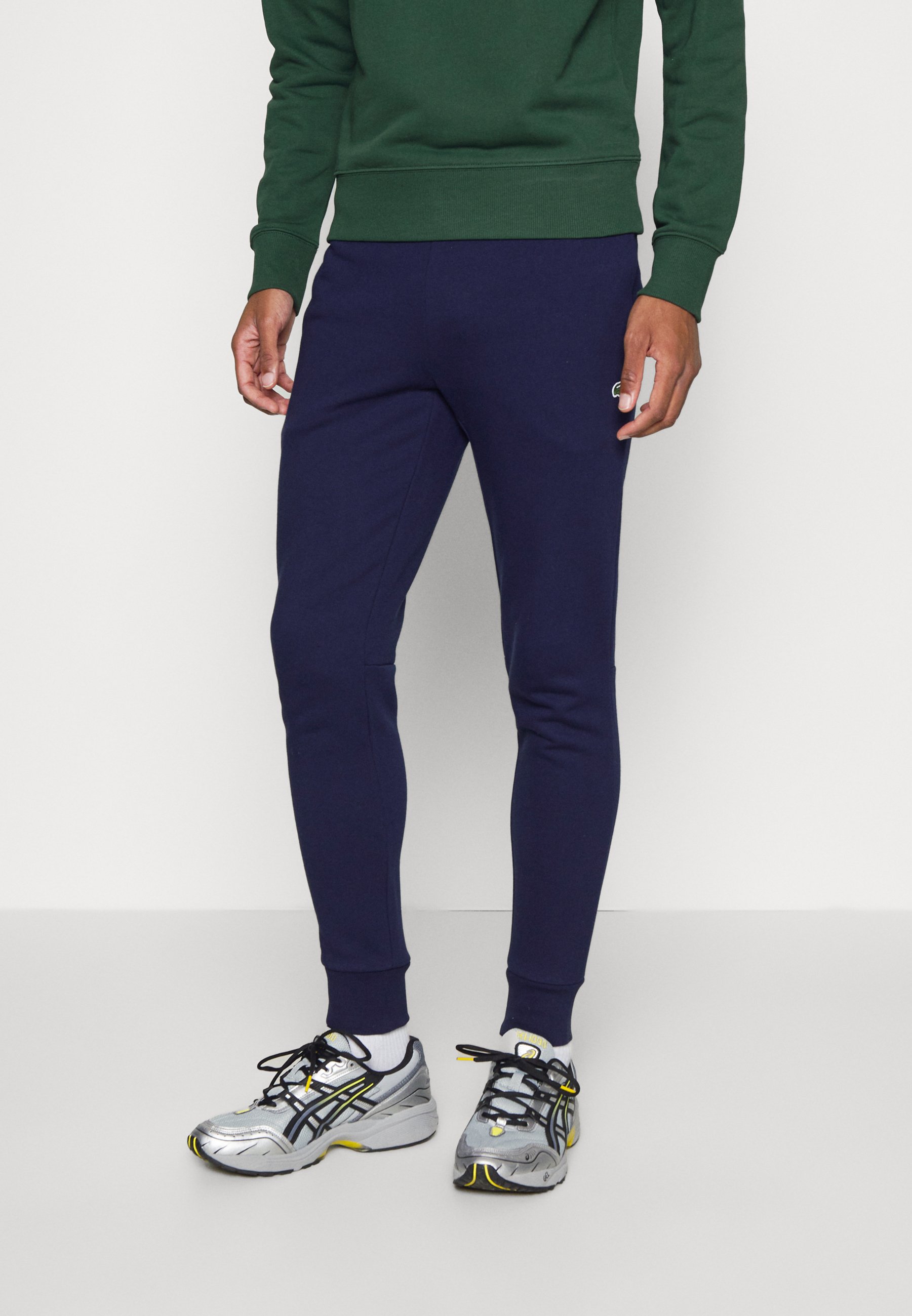 LIFESTYLETRACKPANT UNISEX - Tracksuit bottoms