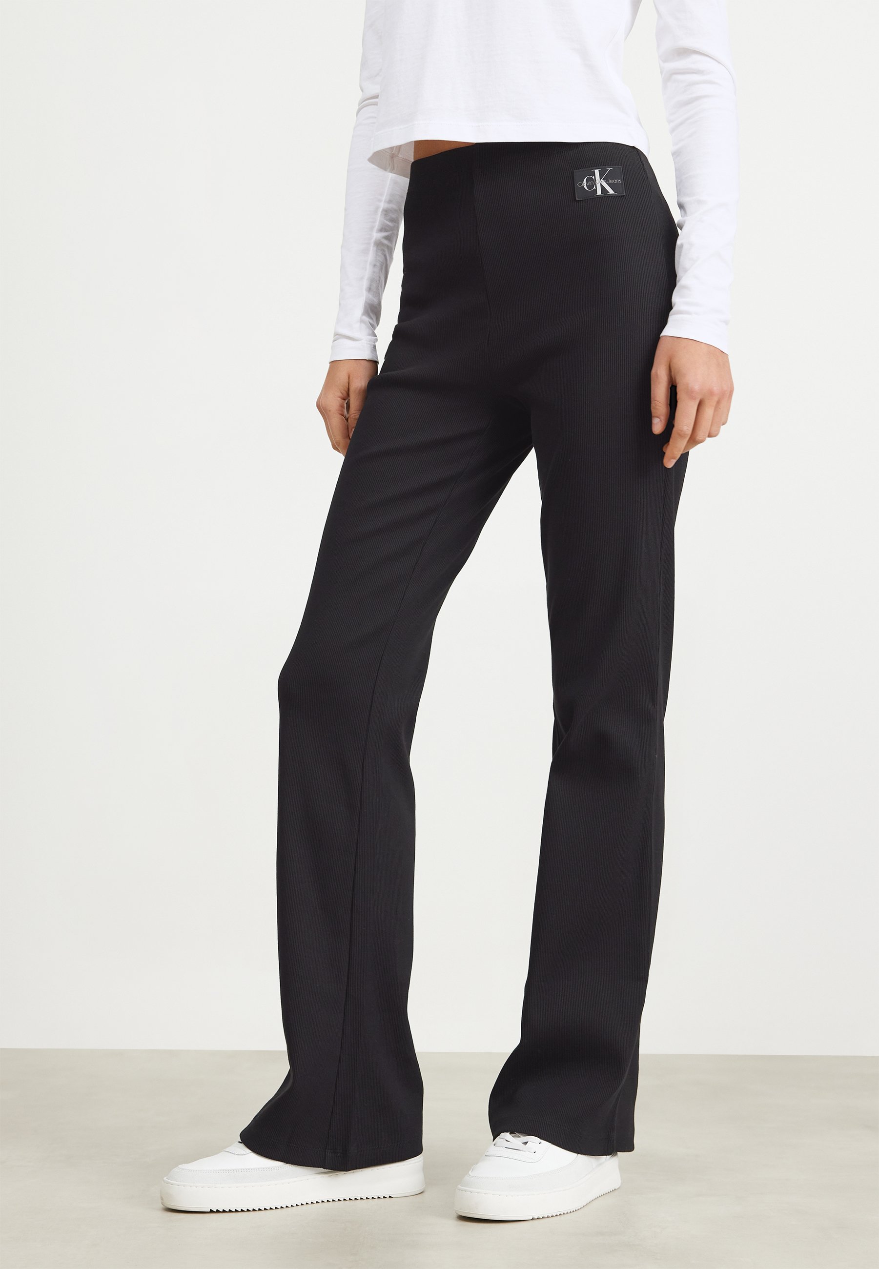 LABEL STRAIGHT PANTS - Trousers