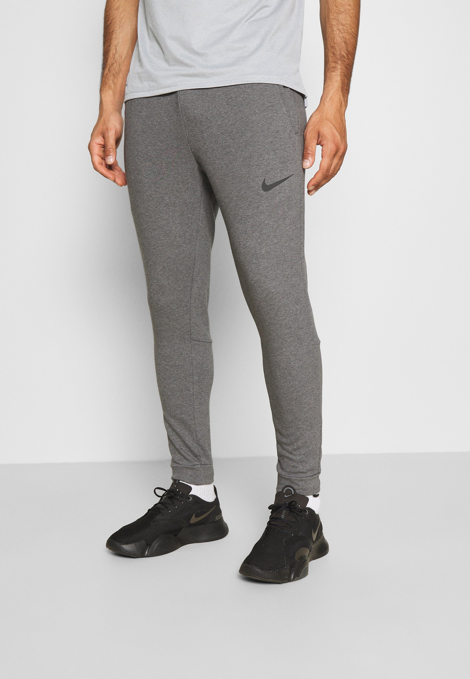 PANT TAPER - Tracksuit bottoms