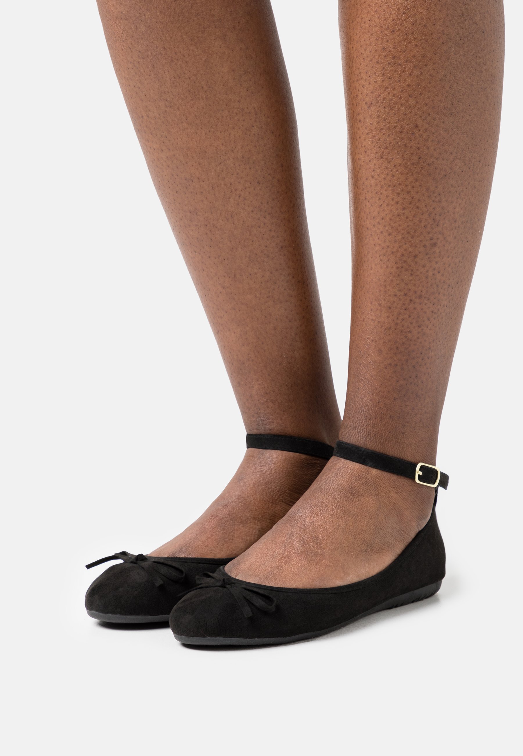 Ankle strap ballet pumps