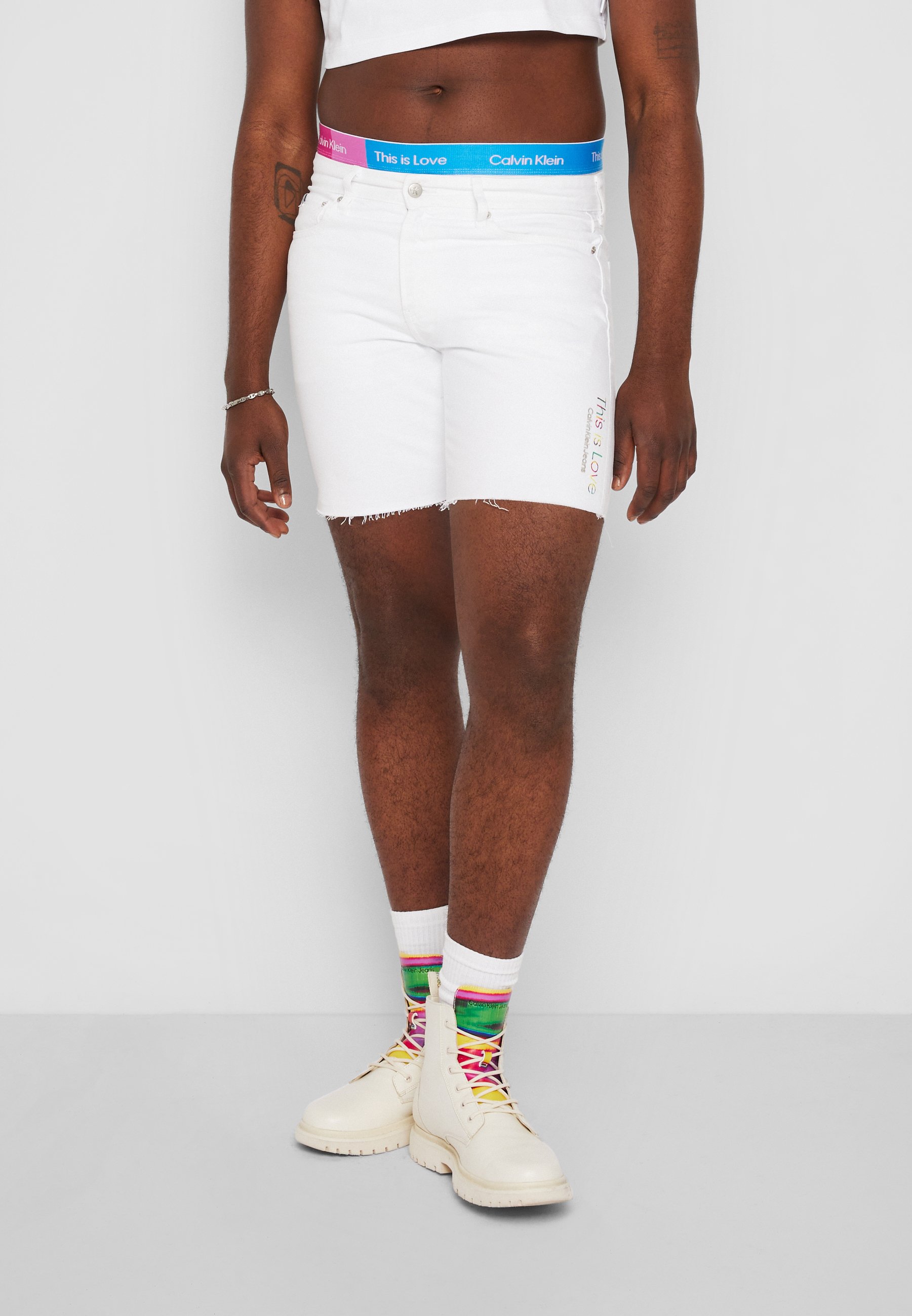 UNISEX - Denim shorts