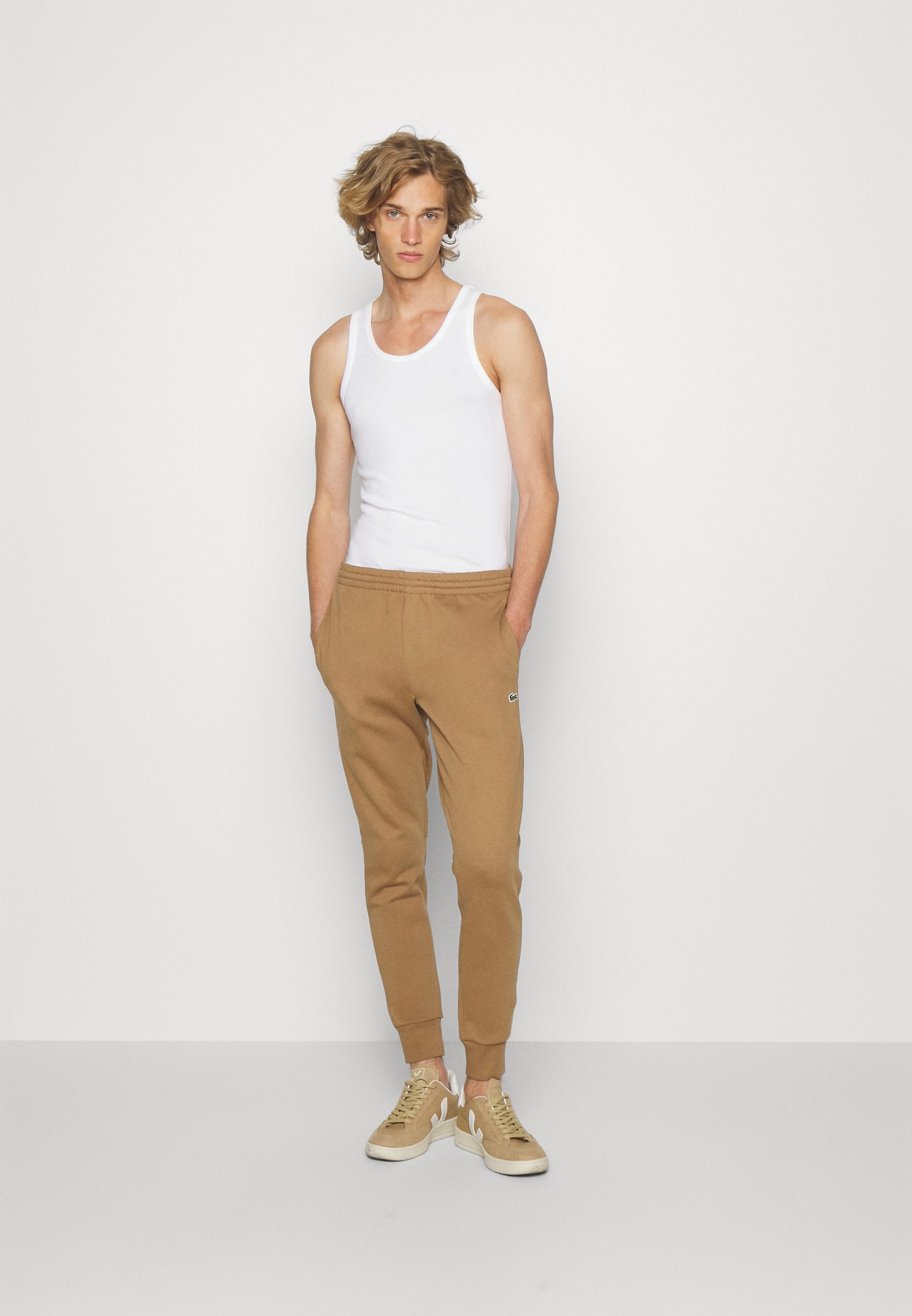 LIFESTYLETRACKPANT UNISEX - Tracksuit bottoms