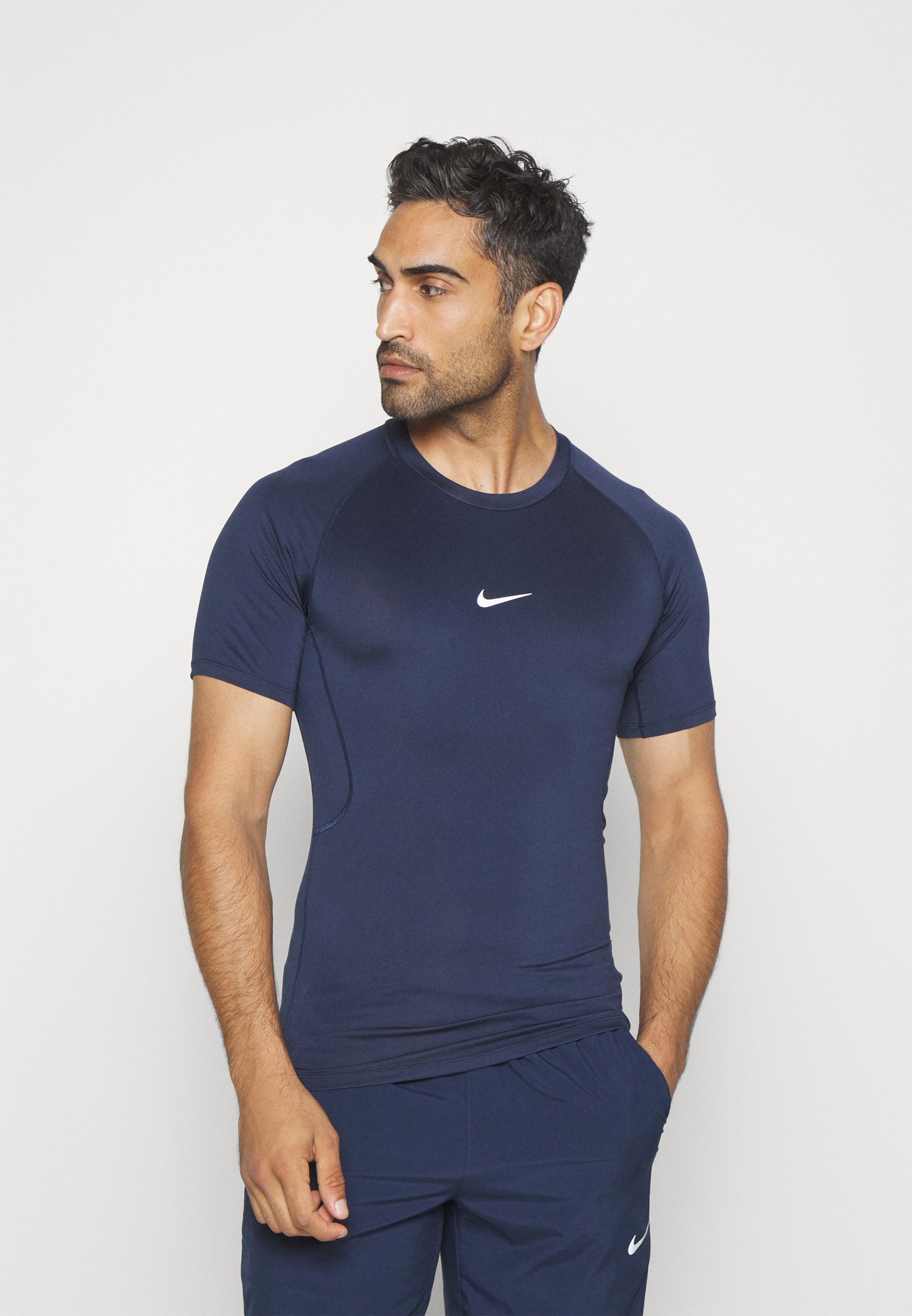 TIGHT - Sports T-shirt