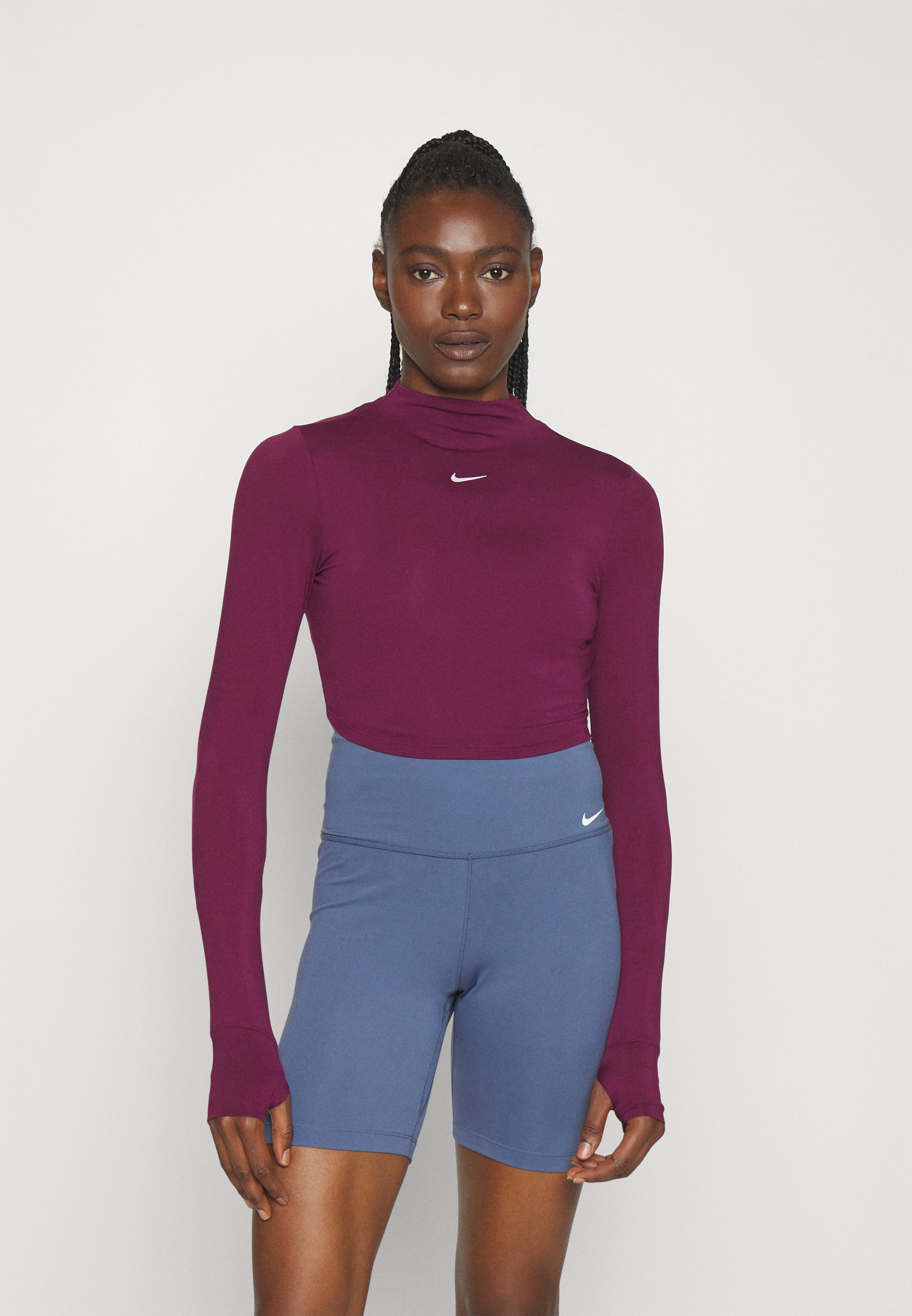 W NK ONE LUXE DF LS CROP ESS - Long sleeved top
