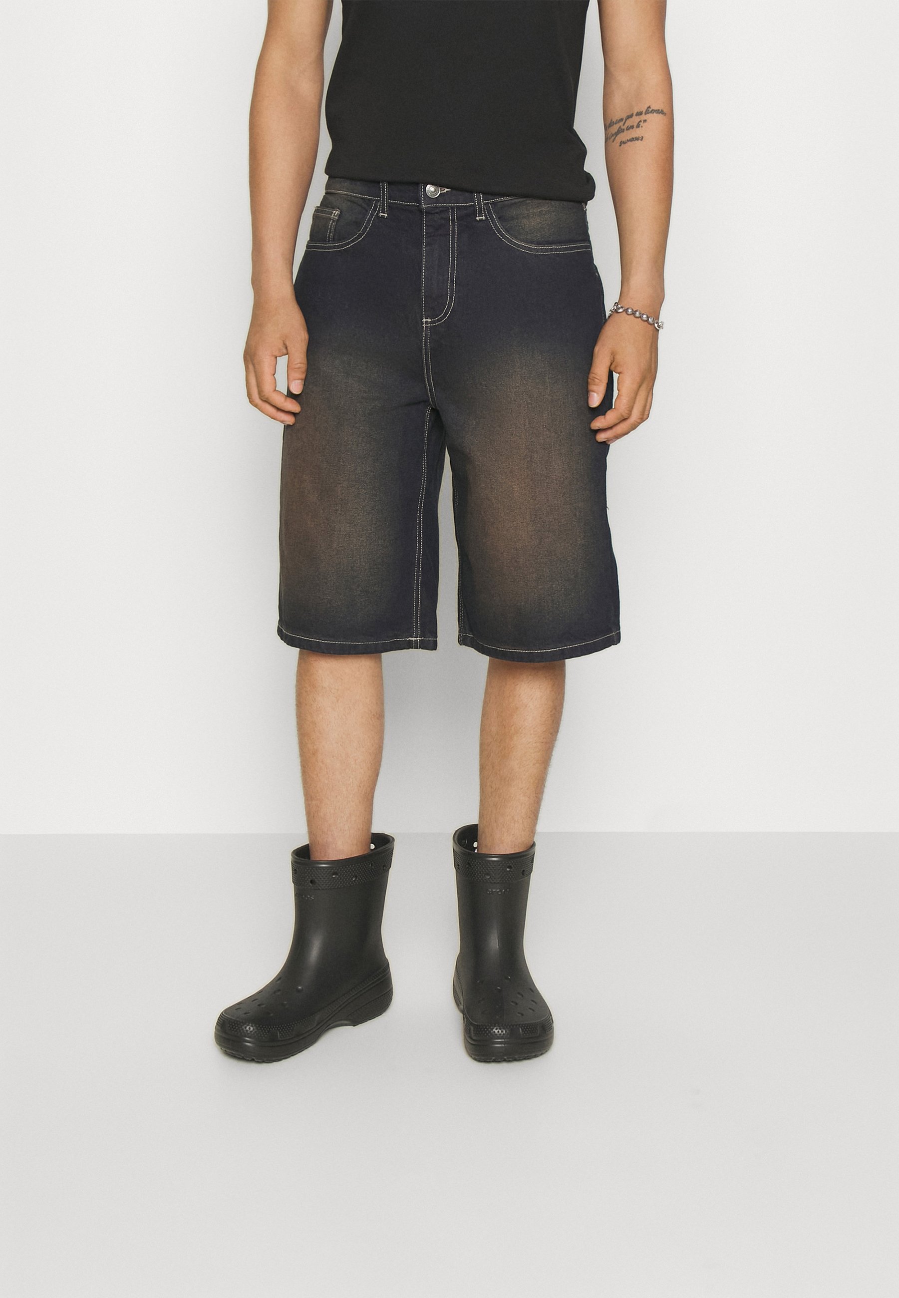 UNISEX - Denim shorts